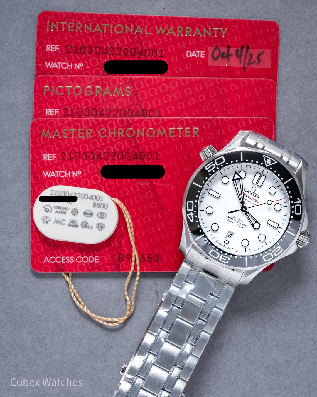 May be an image of digital watch and text that says 'INTERNATIONAL WARRANTY REF DATE 0e+4/25 WATCH N° PICTOGRAMS REF MASTER CHRONOMETER REF WATCH N° 5 ーエて! CHOHO 8800 MC 15K…