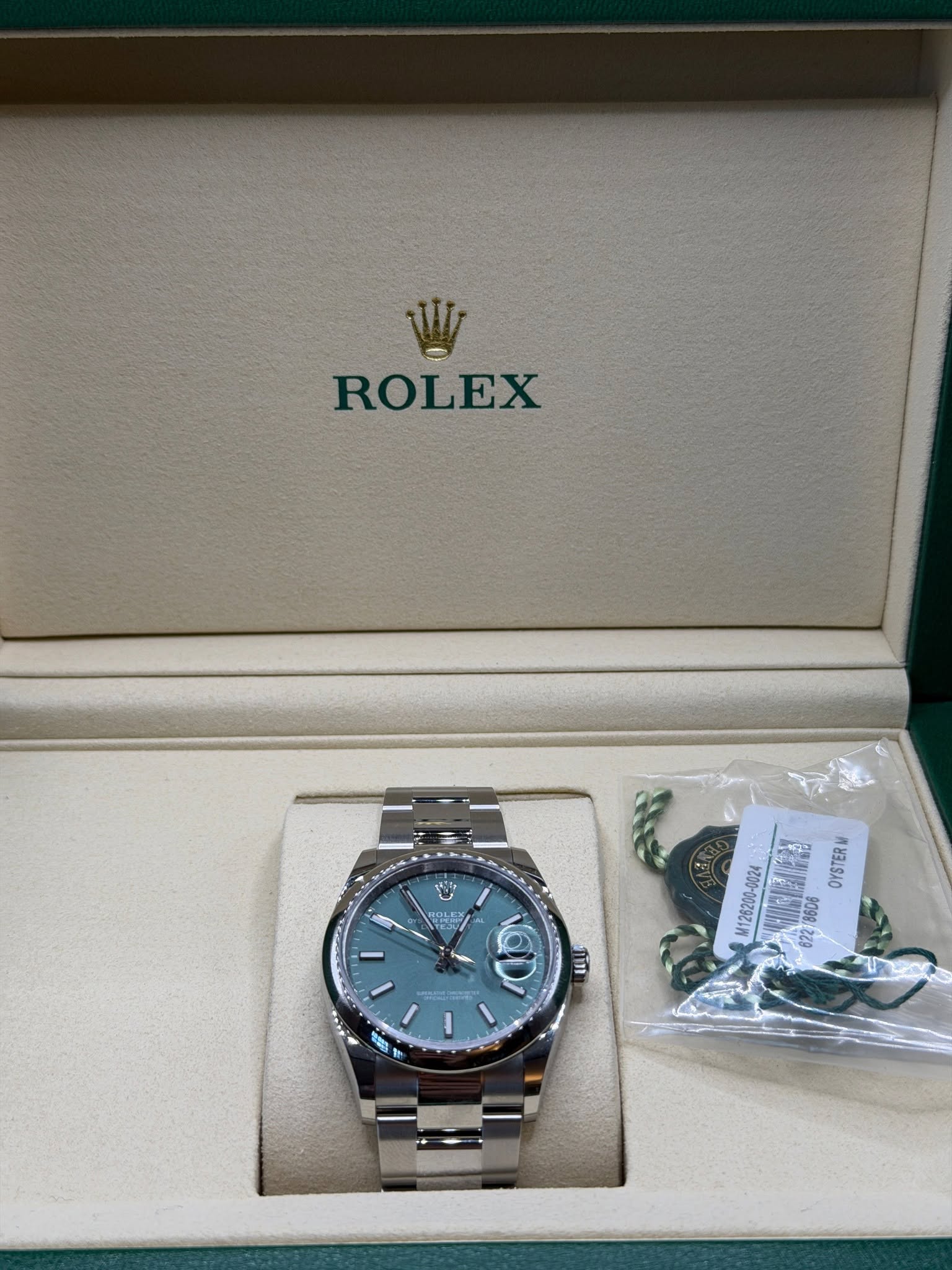 May be an image of wrist watch and text