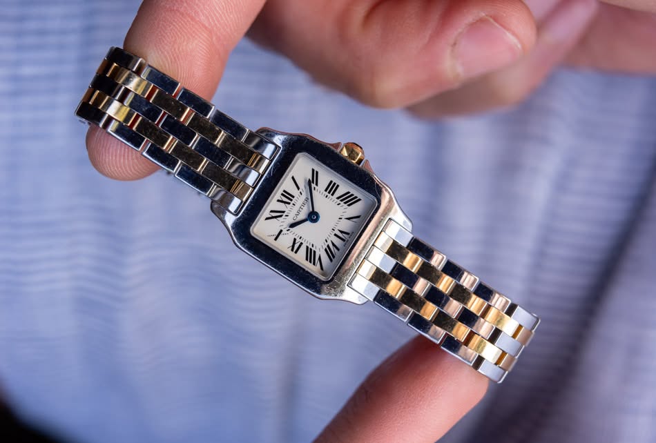 May be an image of digital watch and text