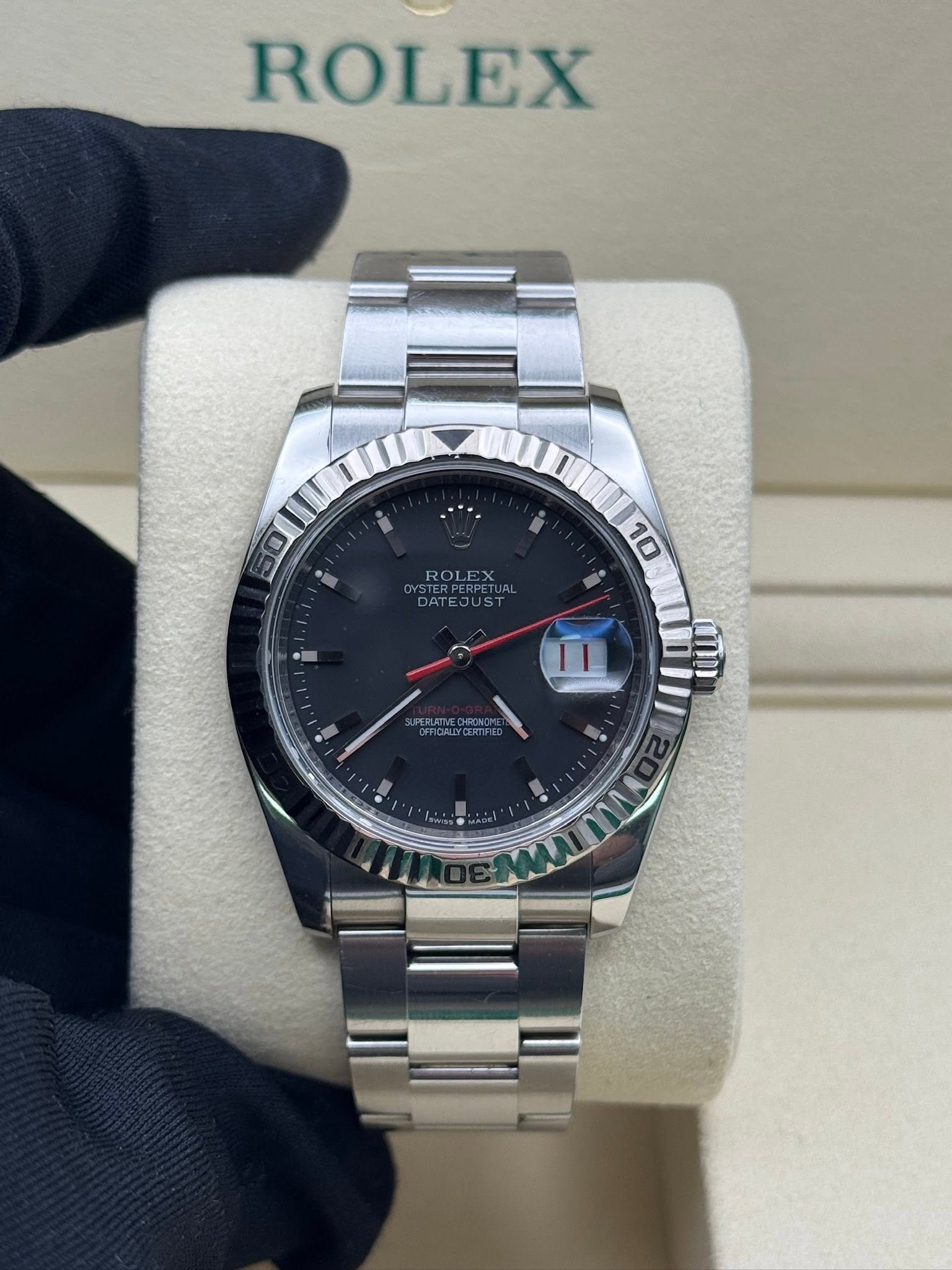 May be an image of wrist watch and text that says 'ROLEX ق i ROLE TERPERPETUAL 10 τ ) OOL'