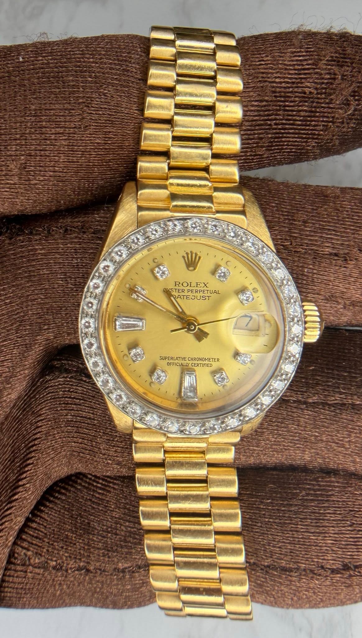 May be an image of wrist watch and text