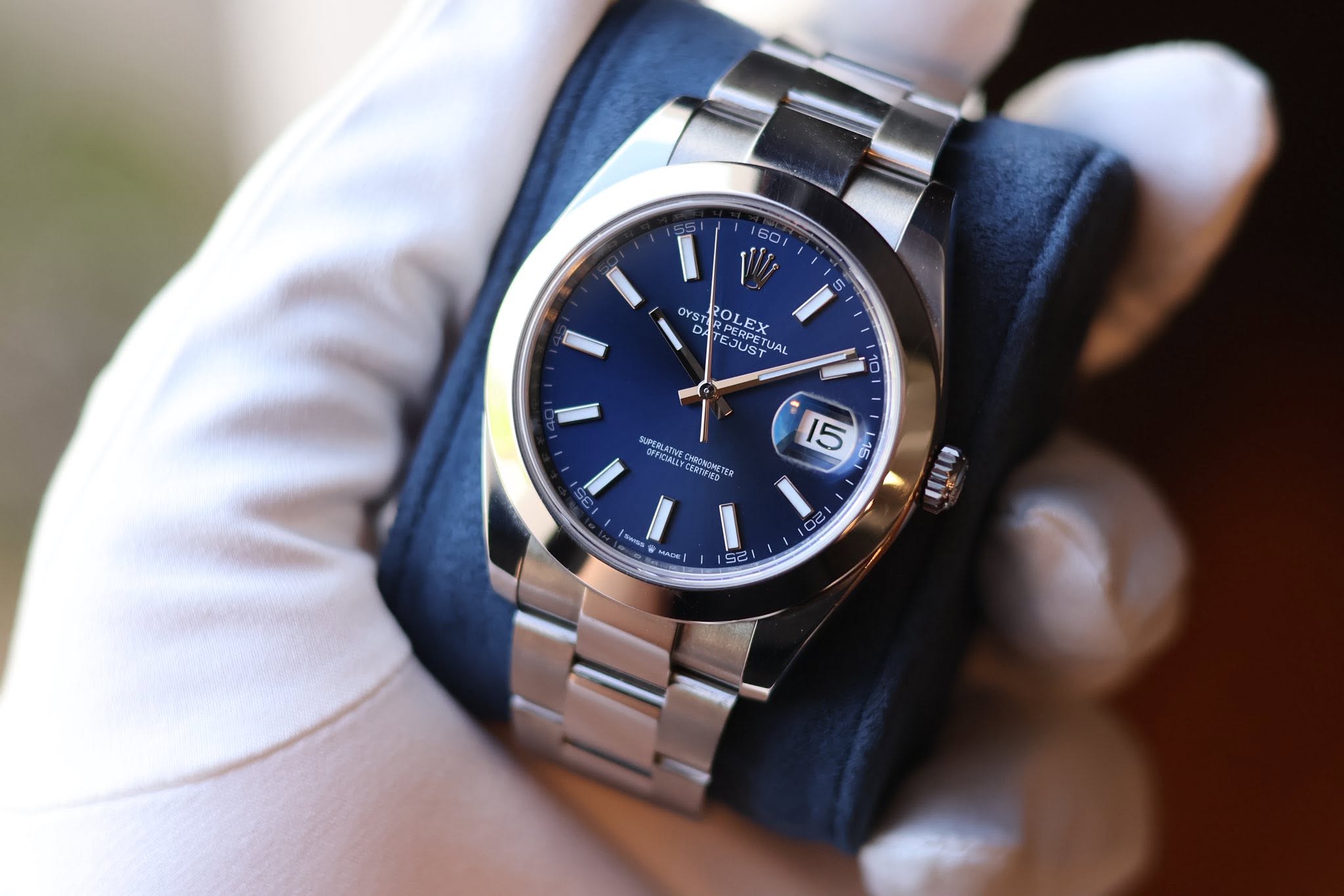 May be an image of wrist watch and text