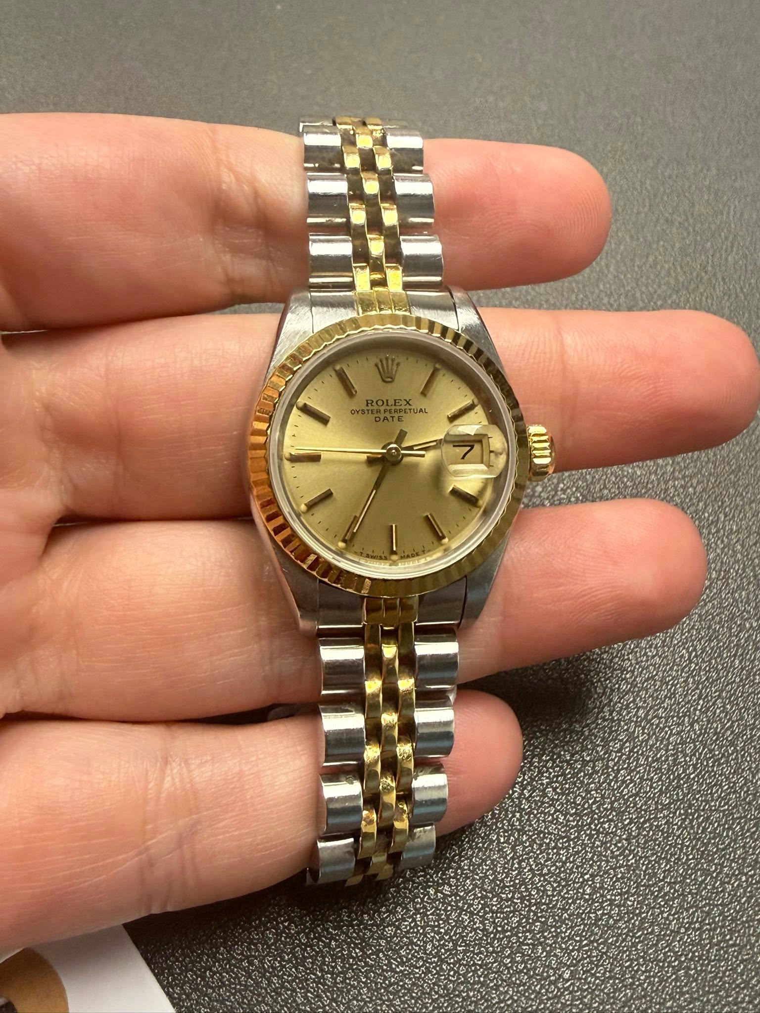 May be an image of wrist watch and text that says 'ROLEX A UAL EX uI'