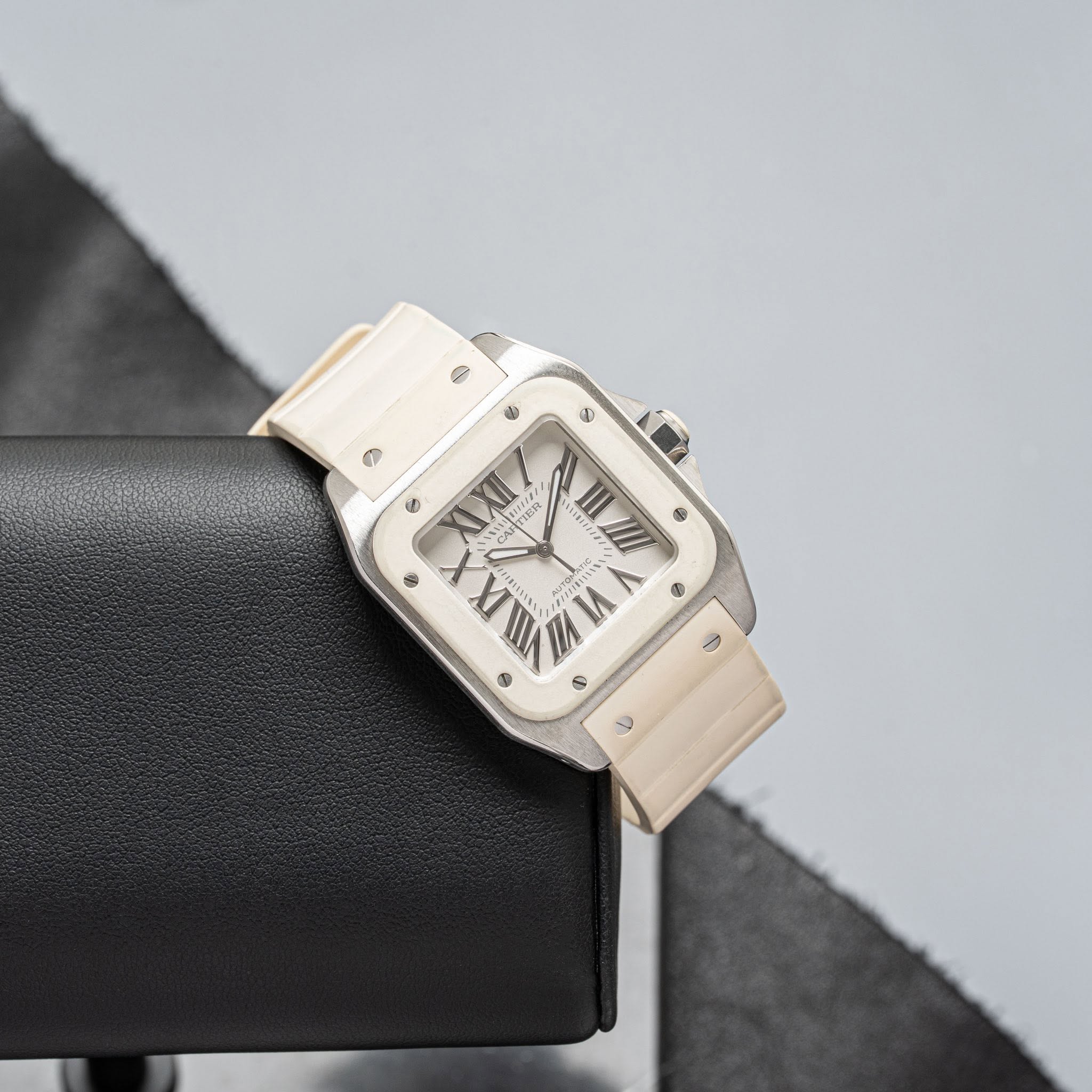 May be an image of wrist watch and text