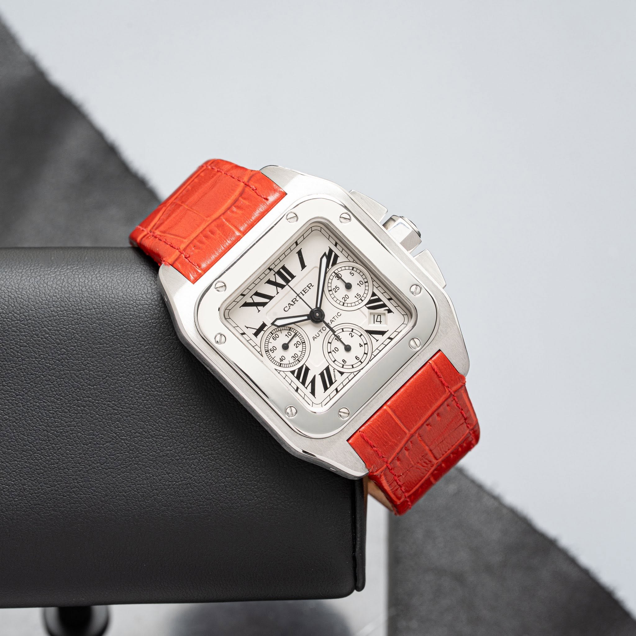 May be an image of wrist watch and text