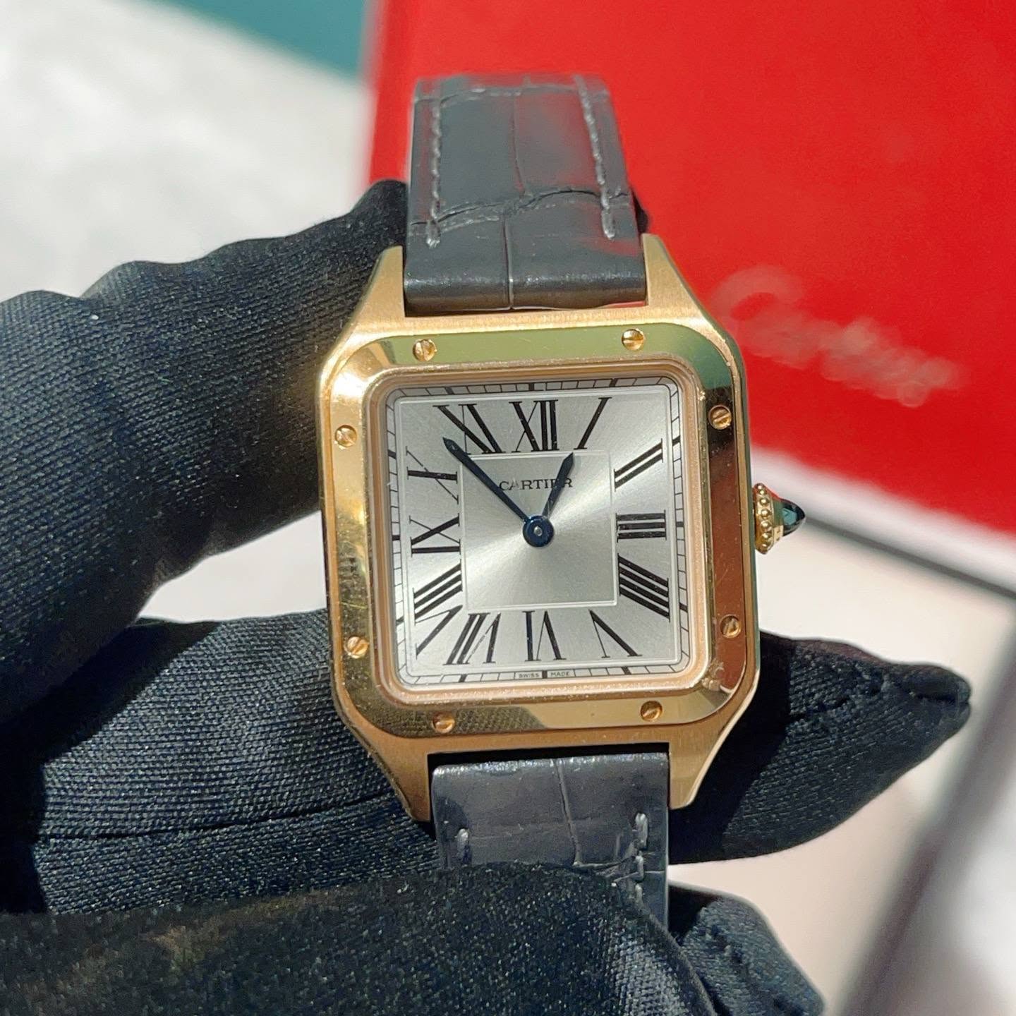 May be an image of wrist watch and text