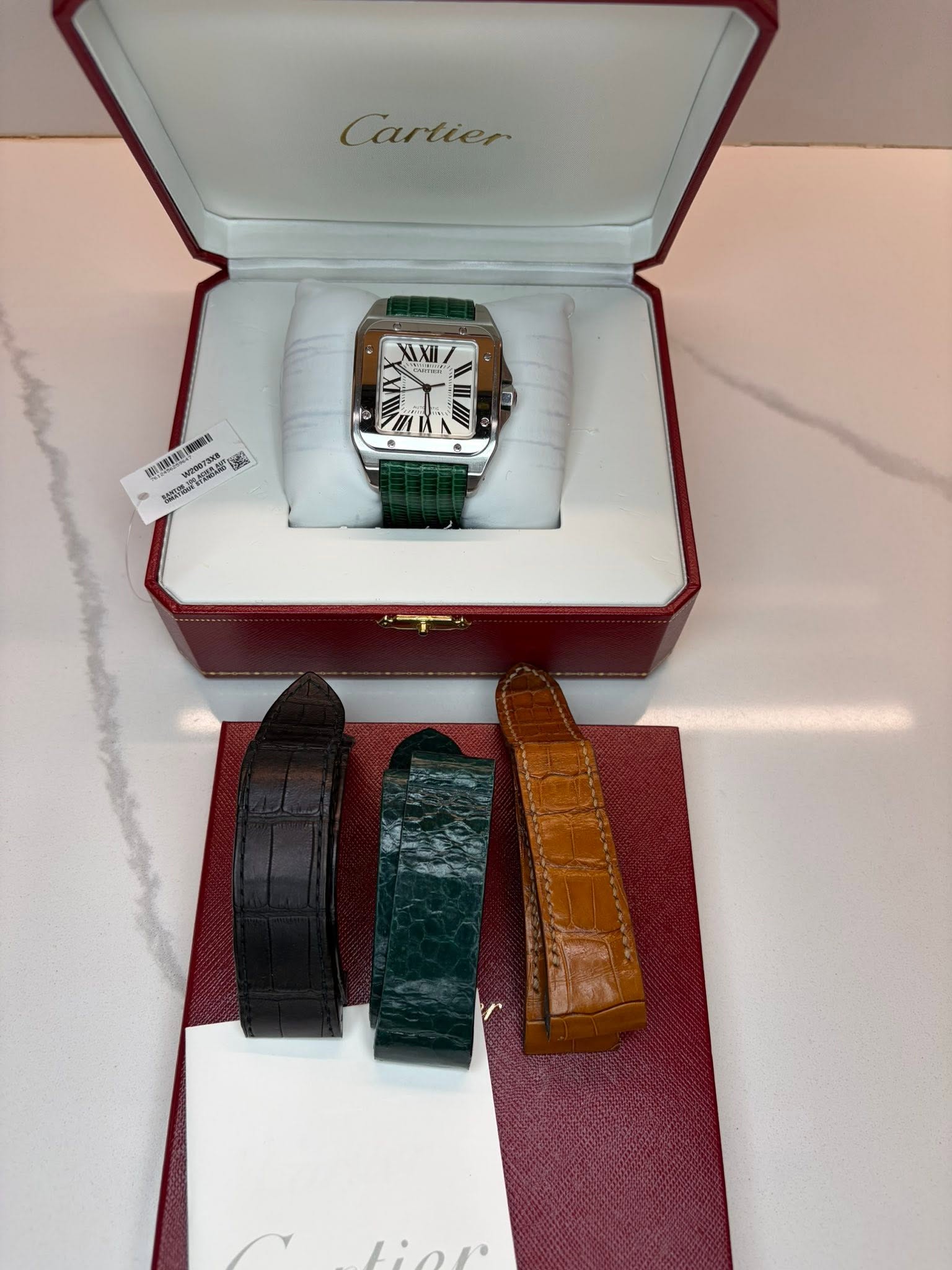 May be an image of wrist watch and text