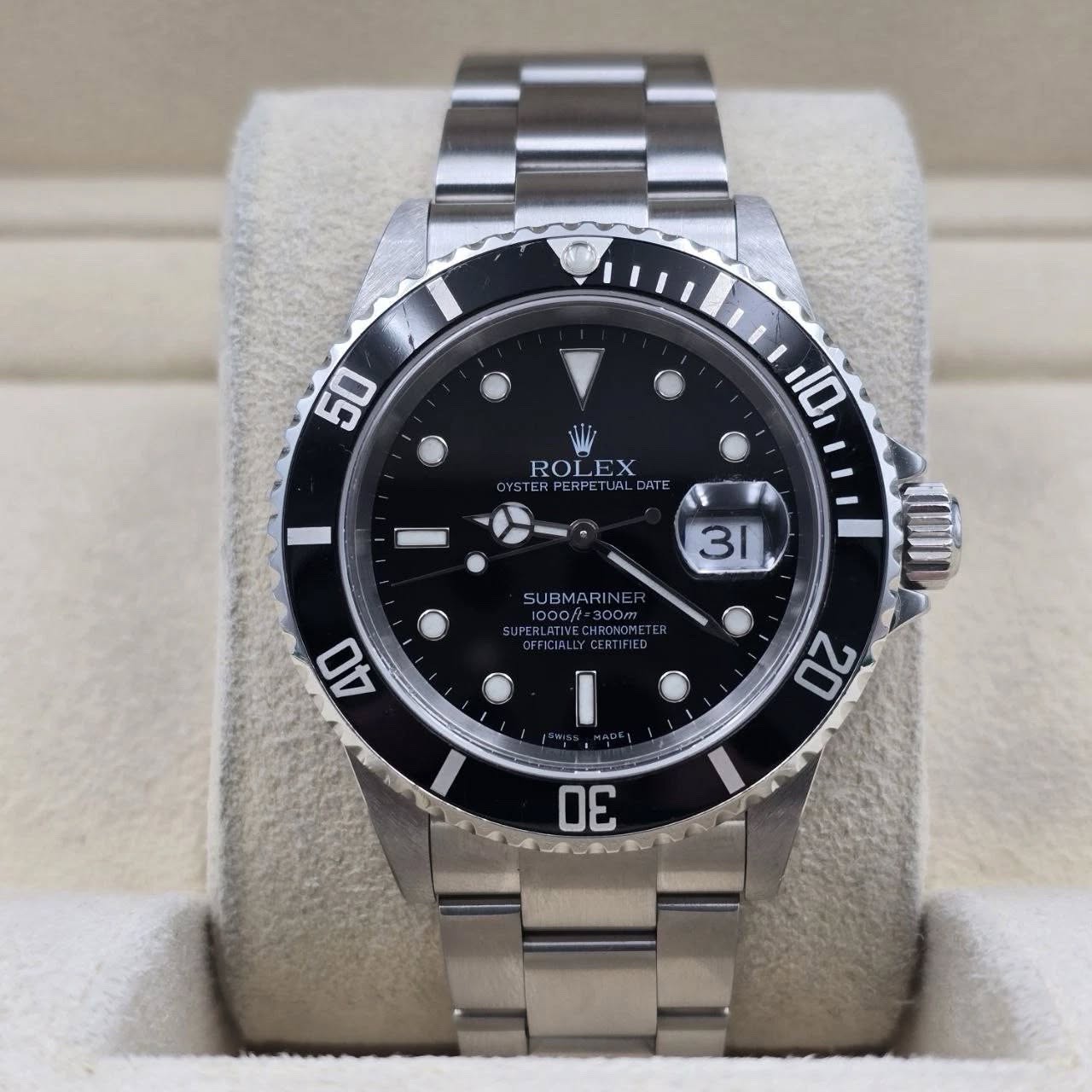 May be an image of wrist watch and text that says '50 110 ROLEX ROL YSTER STERPERPETJALDATE ERPERPET.IALCHIE DATE い 31 SUBMARIN NE BMAF 1000/= 300m PLOTINE CHACN CHRONOM 40 20 30'
