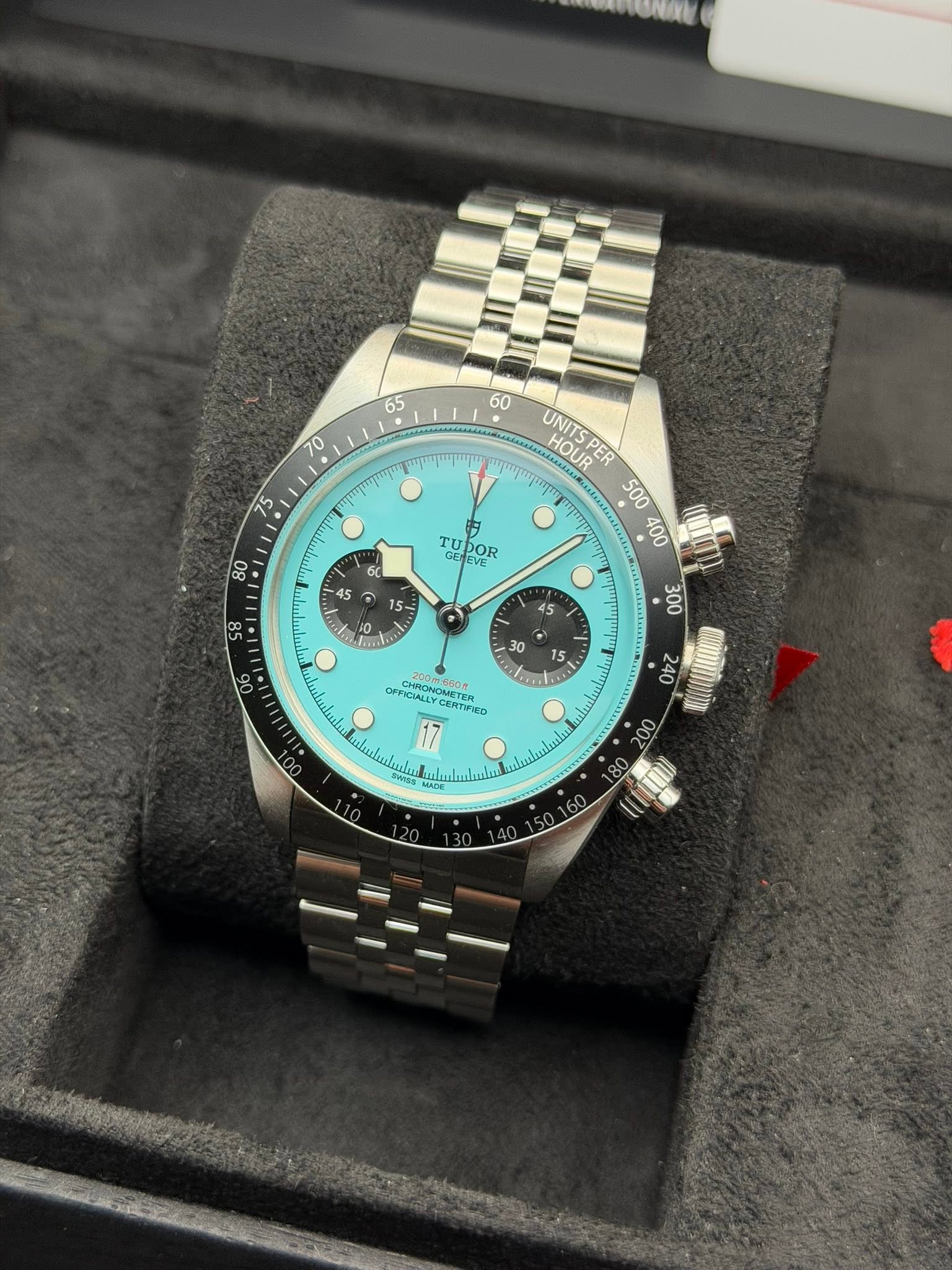 May be an image of wrist watch and text
