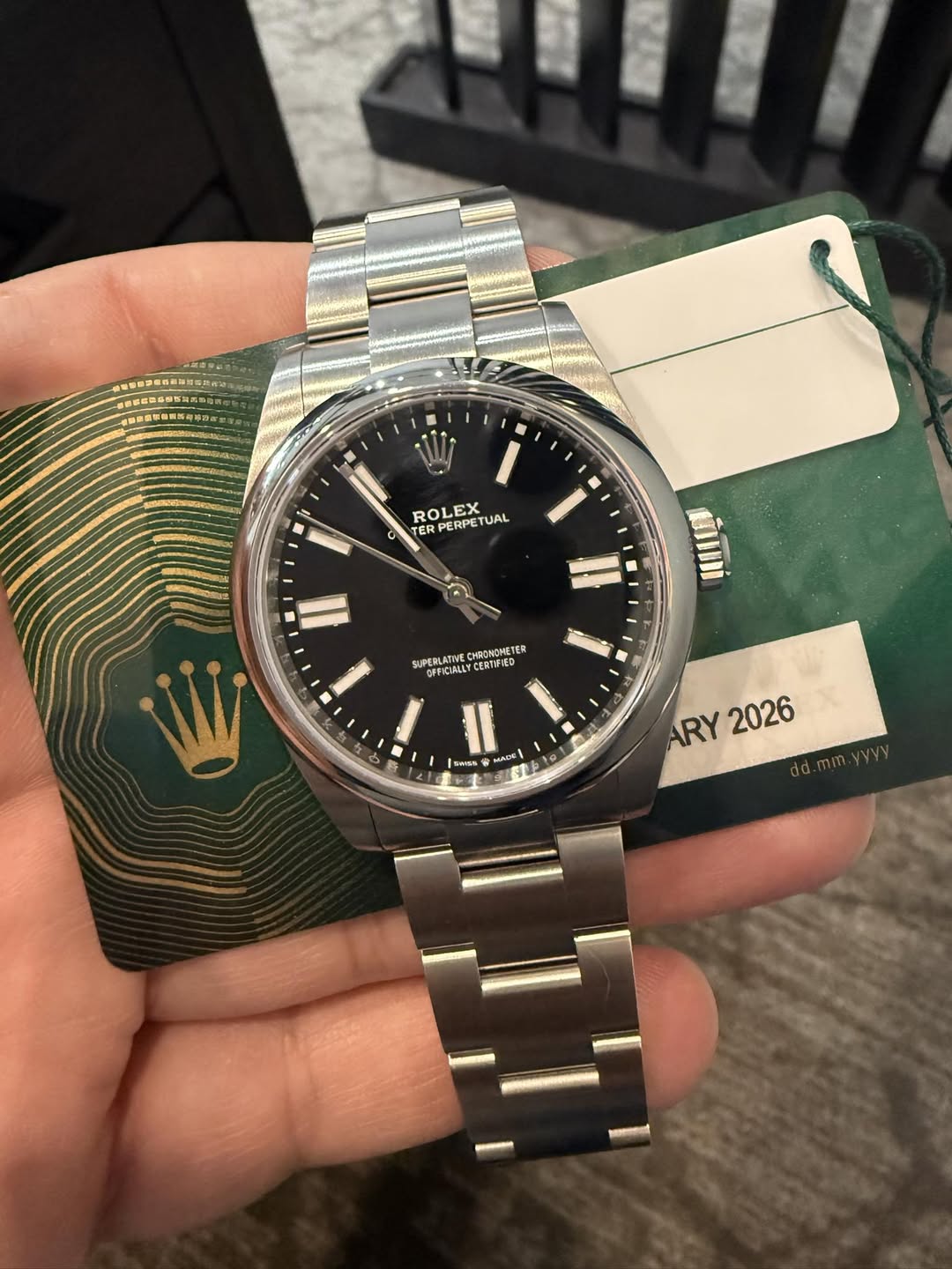 May be an image of wrist watch and text