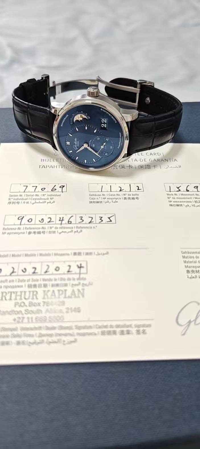 May be an image of wrist watch and text