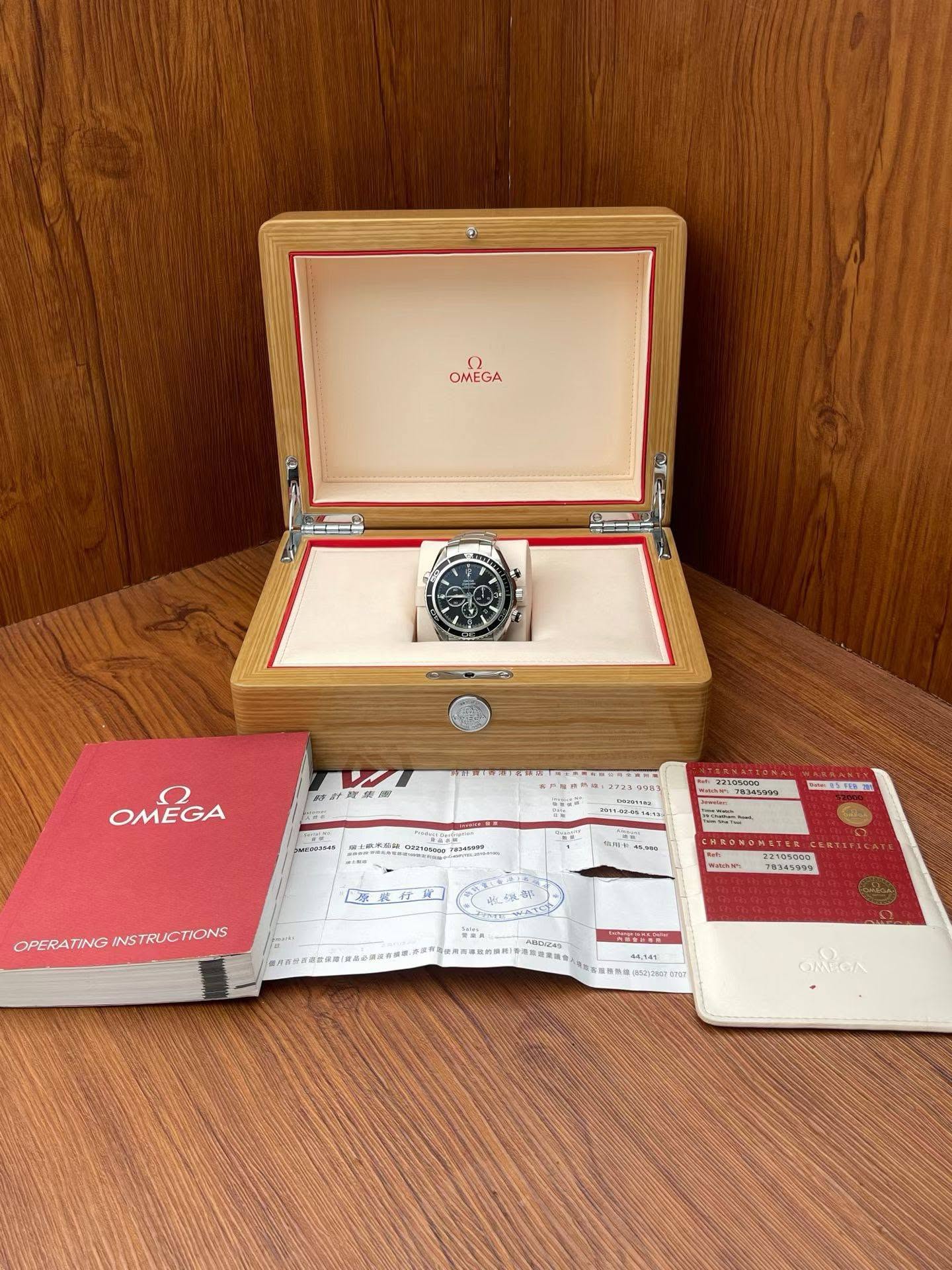 May be an image of wrist watch, matchbook and text