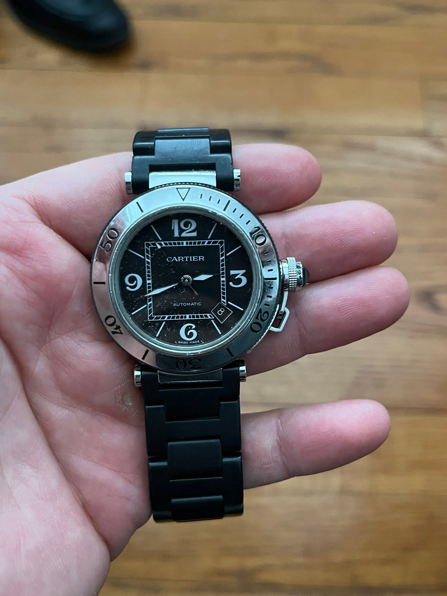 May be an image of wrist watch and strap