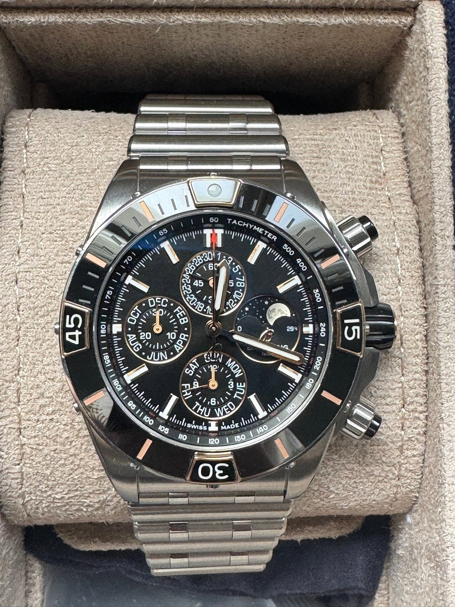 May be an image of wrist watch and text