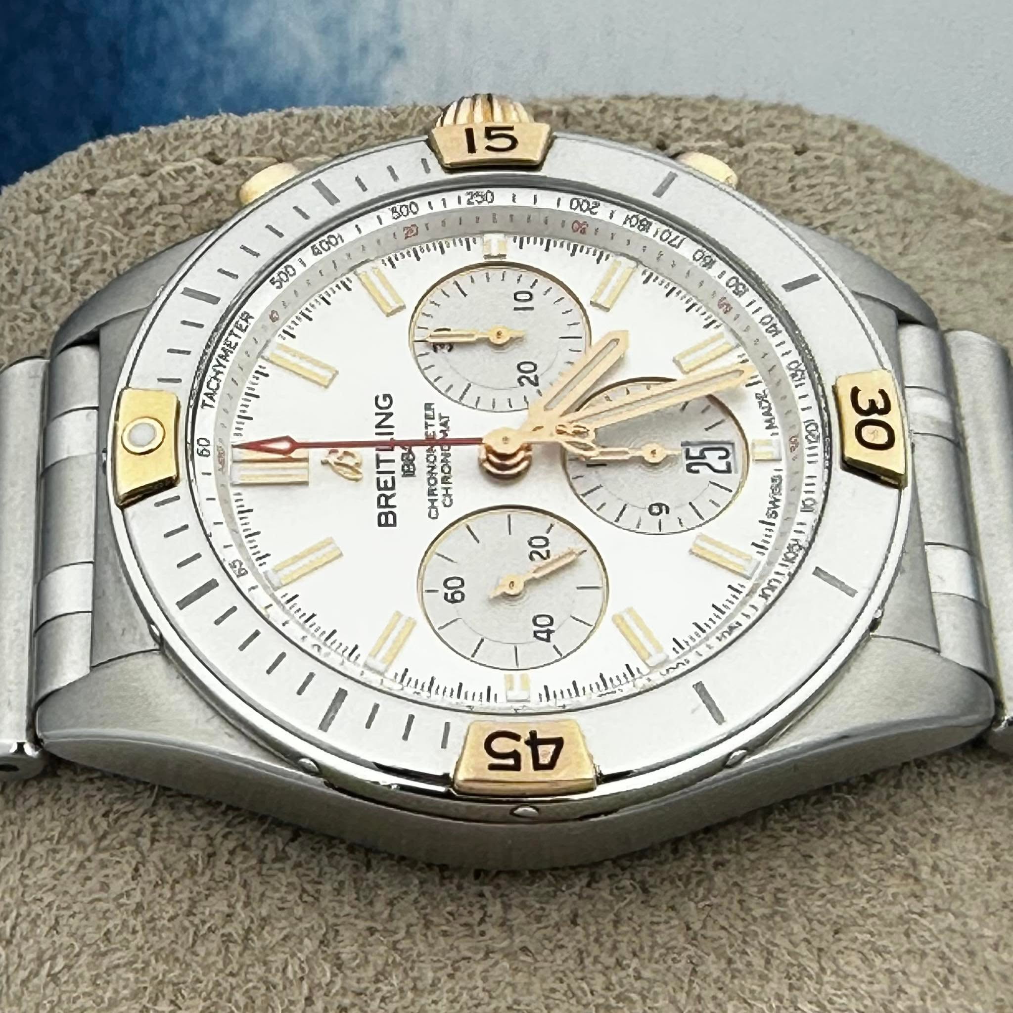 May be an image of wrist watch and text