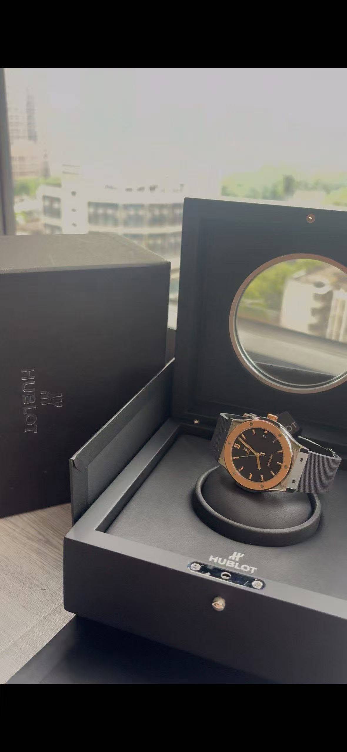 May be an image of wrist watch and text