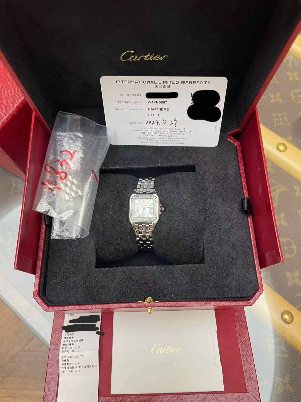 May be an image of wrist watch and text