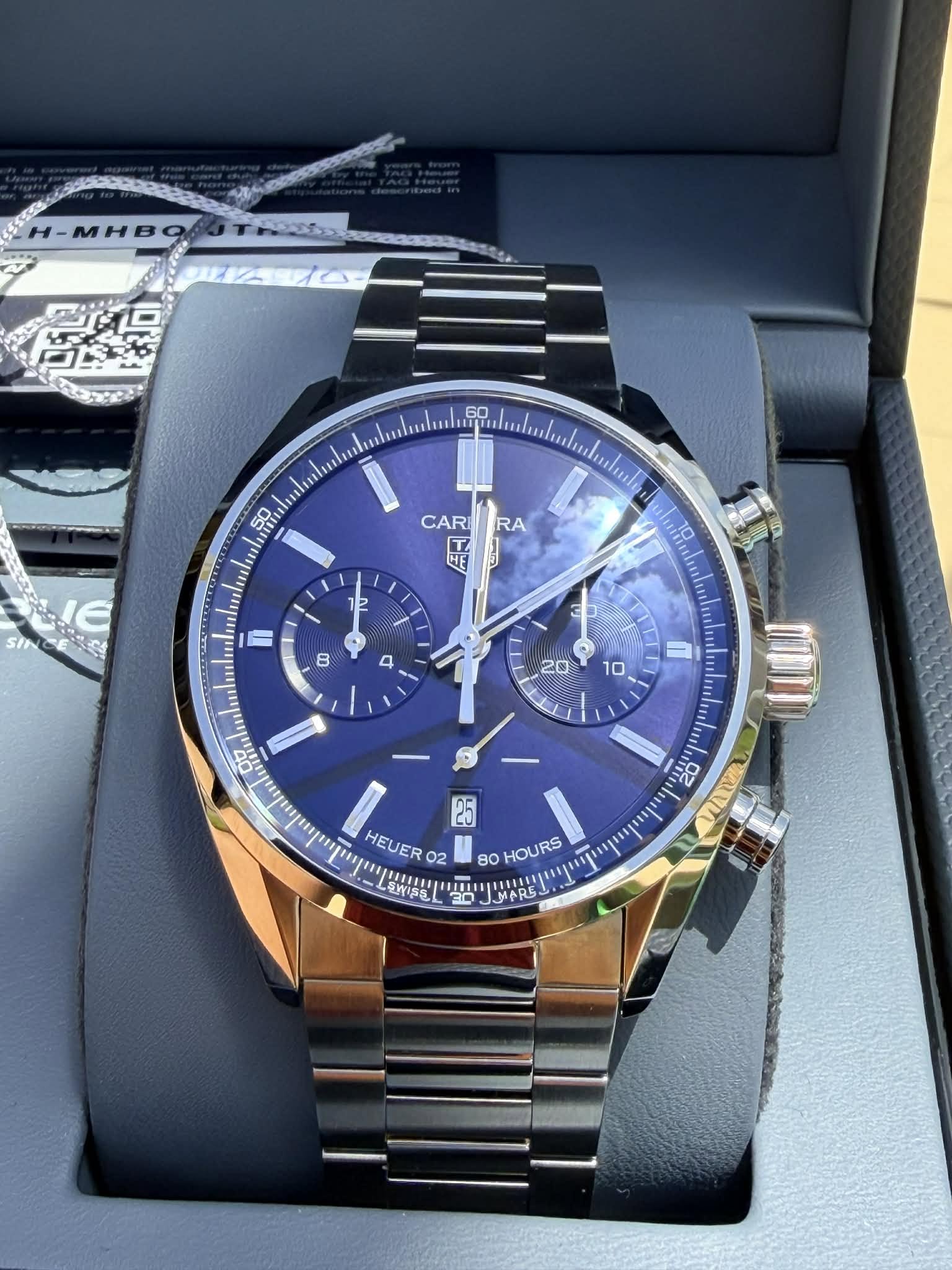 May be an image of wrist watch and text