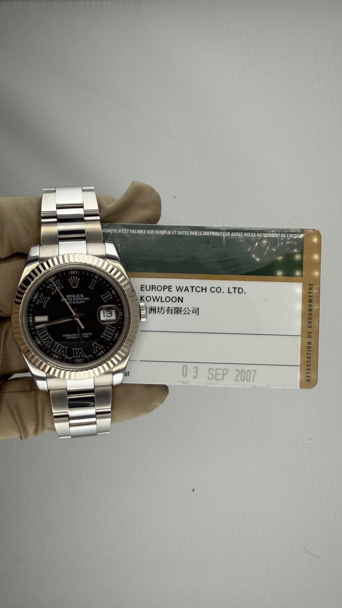 May be an image of wrist watch and text that says 'ACTИ WEST MALABLI QUE REMPULE DATEE ABI 6TaHиT AGRE ROLEXA ΜO OMENTA AQIA EUROPE EUROPEWATCHCO.LTD. WATCH co. LTD. OWLOON 目…