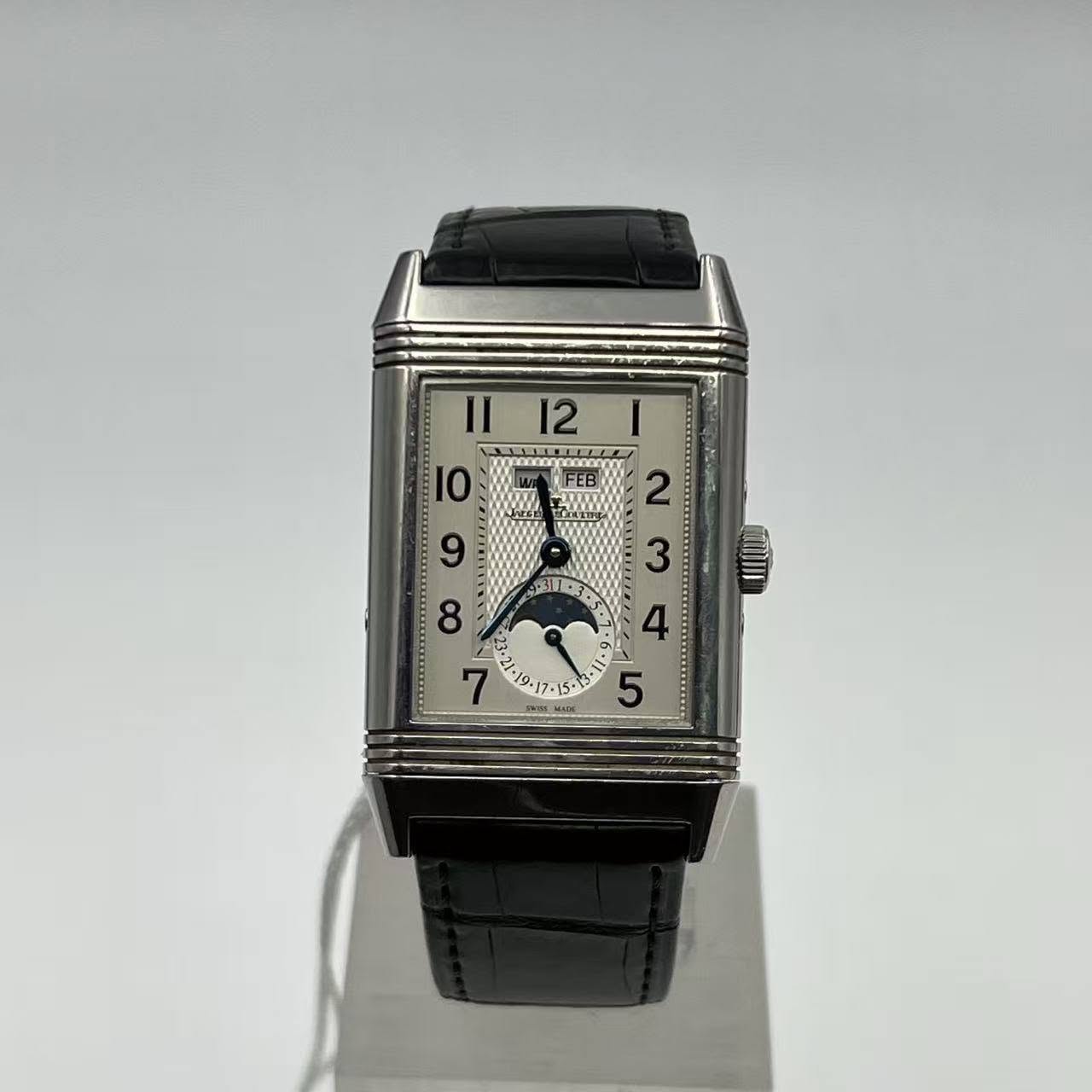 May be an image of wrist watch and text that says 'II 12 O EED T FEB न 2 و 3 8 33 4 OII ٠ _ ی'
