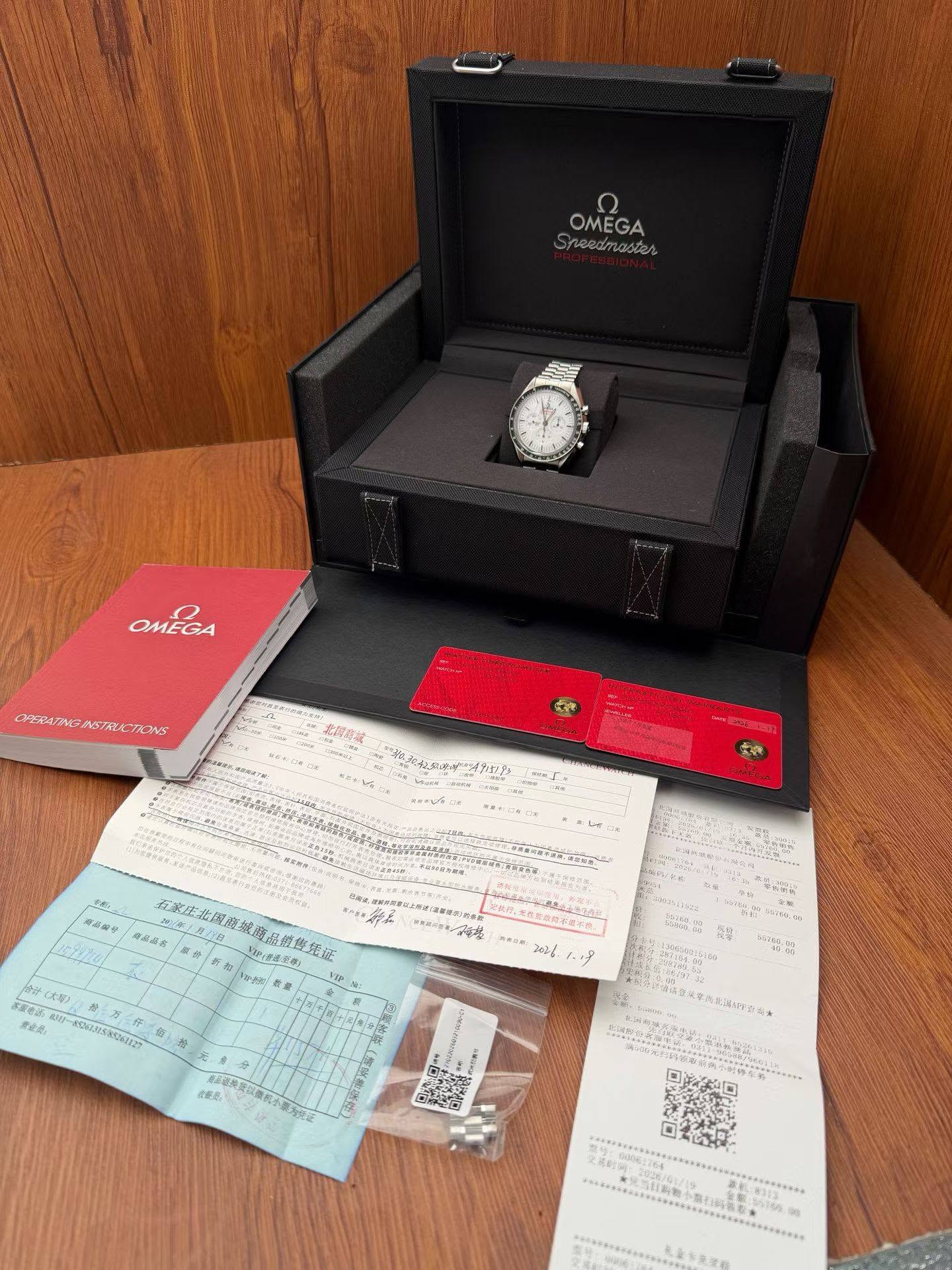 May be an image of wrist watch, cufflinks and text