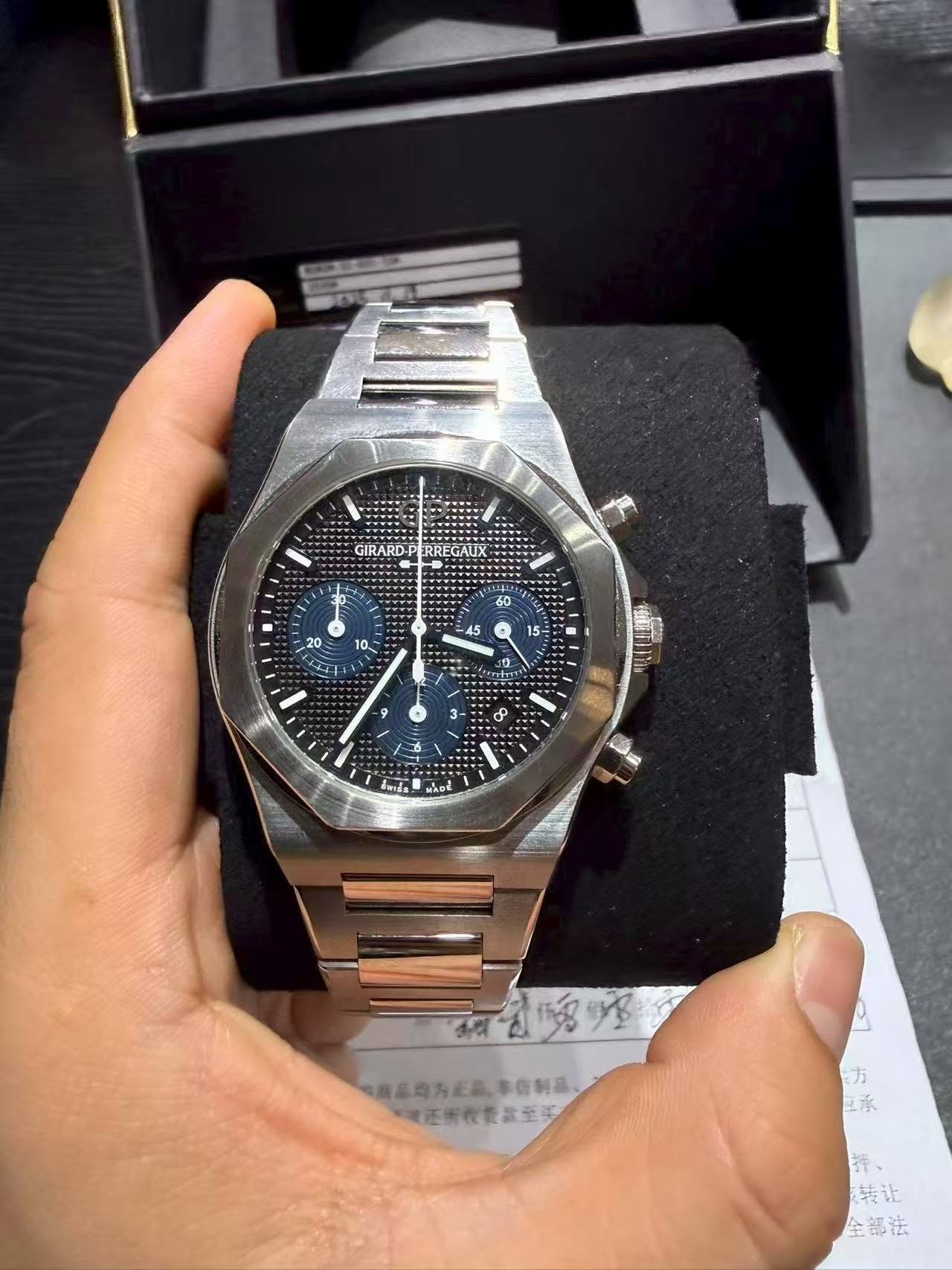 May be an image of wrist watch and text