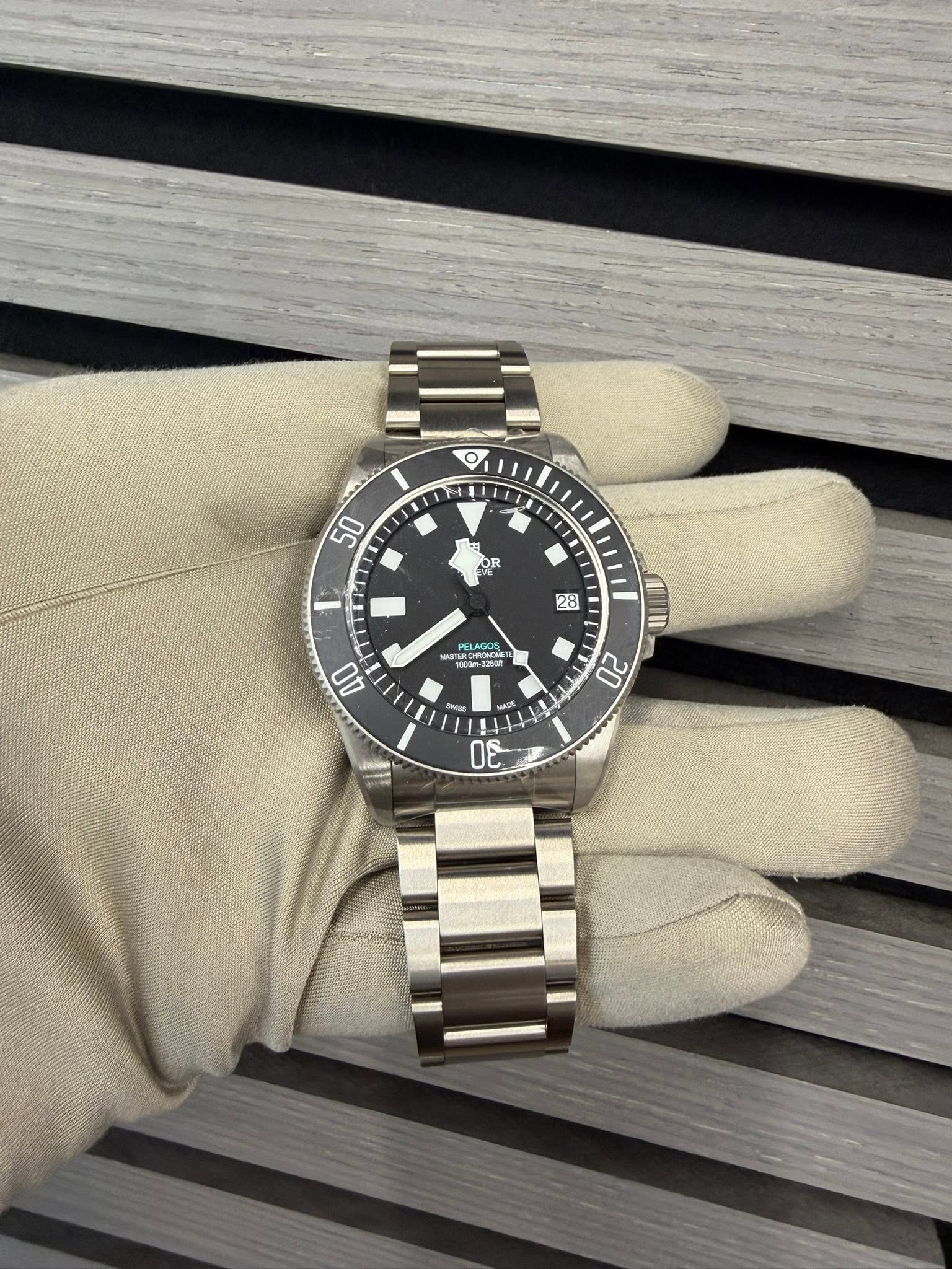 May be an image of wrist watch and text