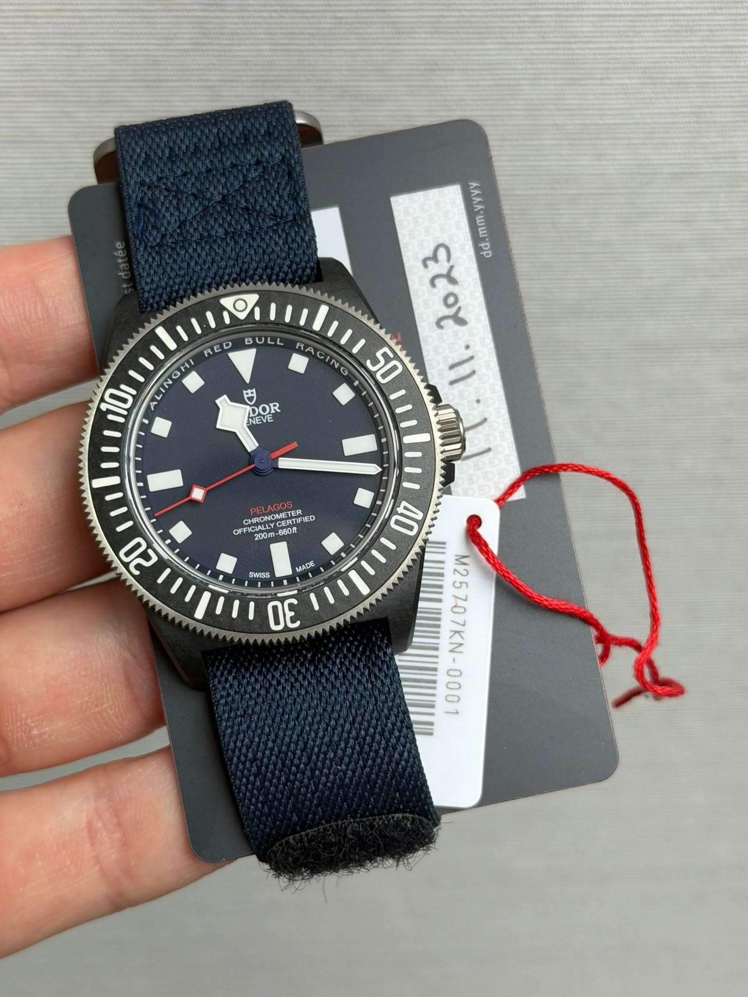 May be an image of wrist watch and text
