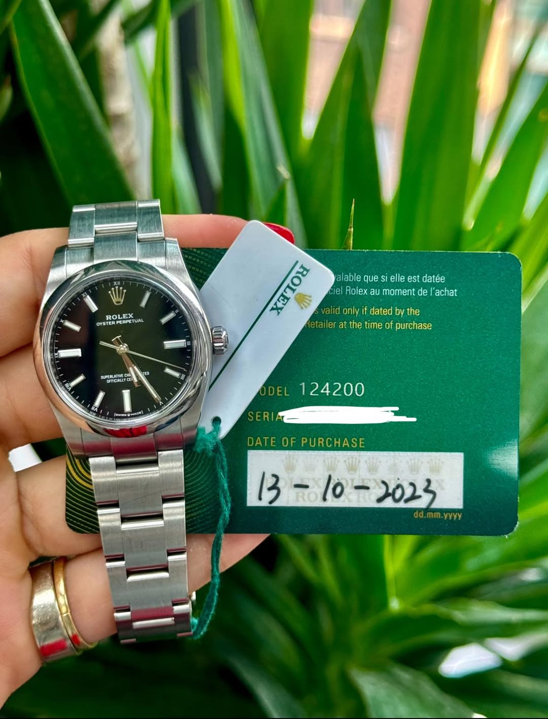 May be an image of wrist watch and text that says 'ROLEX TUAL TUAL DYST K validonlyifdatedbythe valid onlyi dated bythe alable quesi alablequesielleestdatée lees ell es datée el…