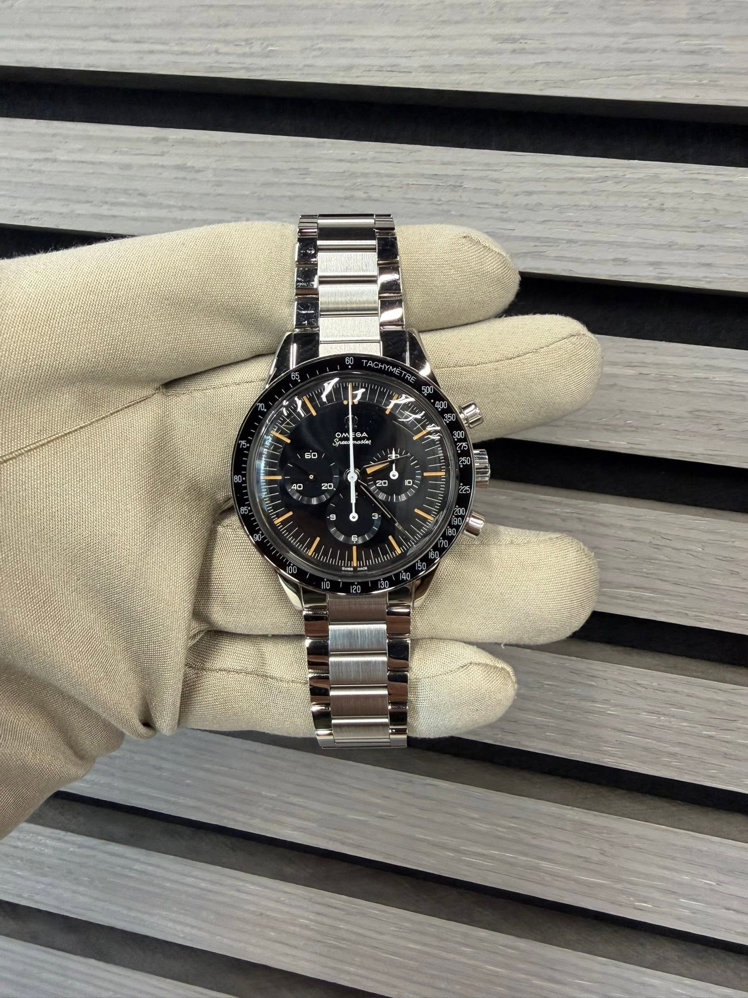 May be an image of wrist watch and text