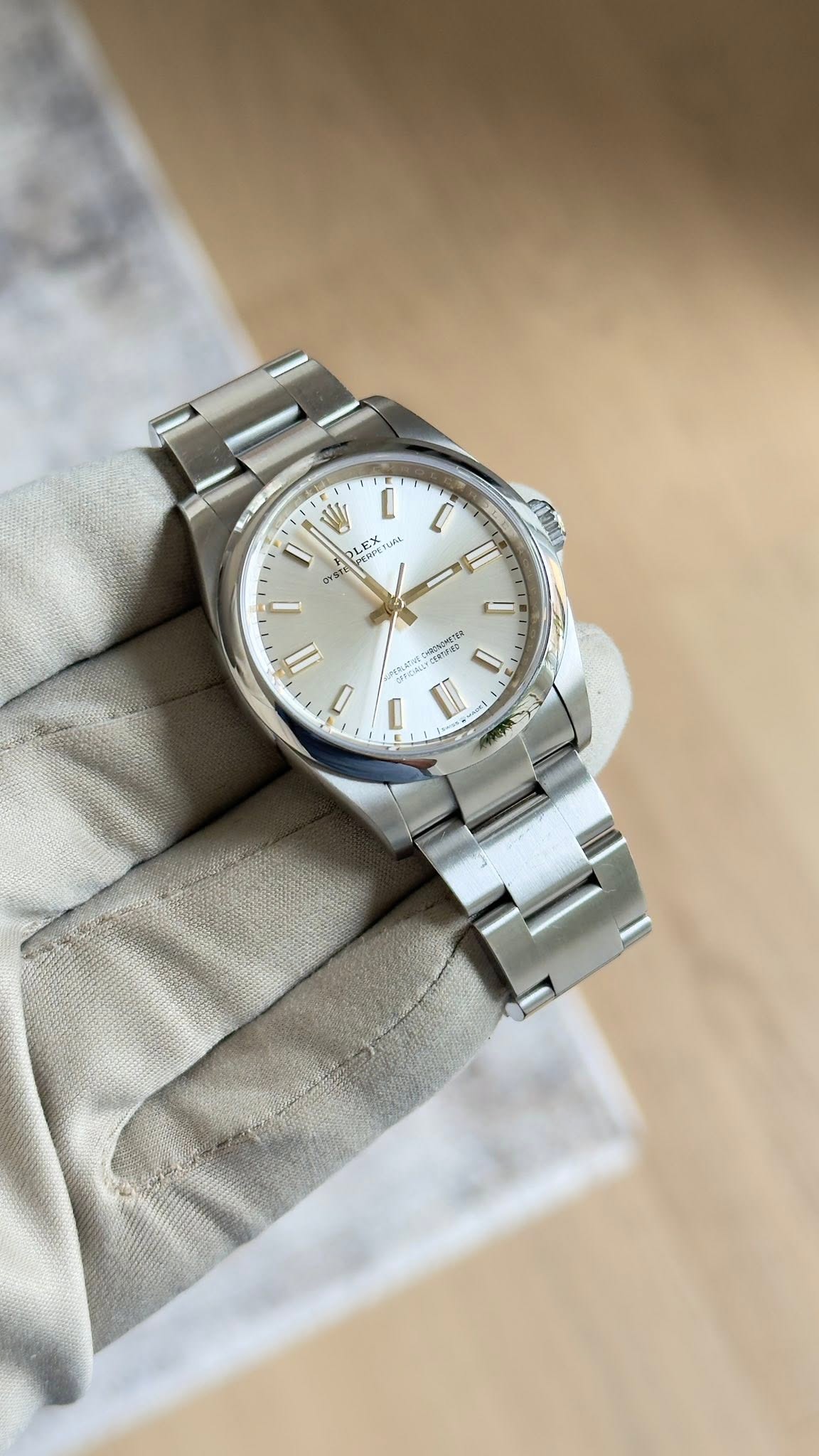 May be an image of wrist watch and text