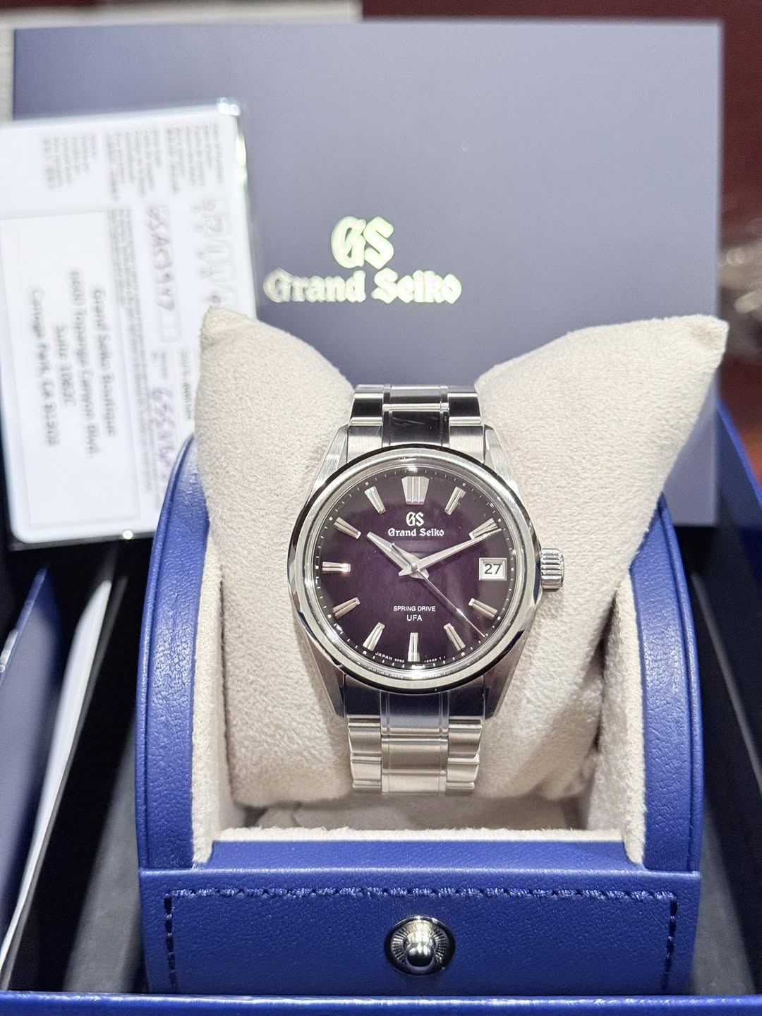 May be an image of wrist watch and text