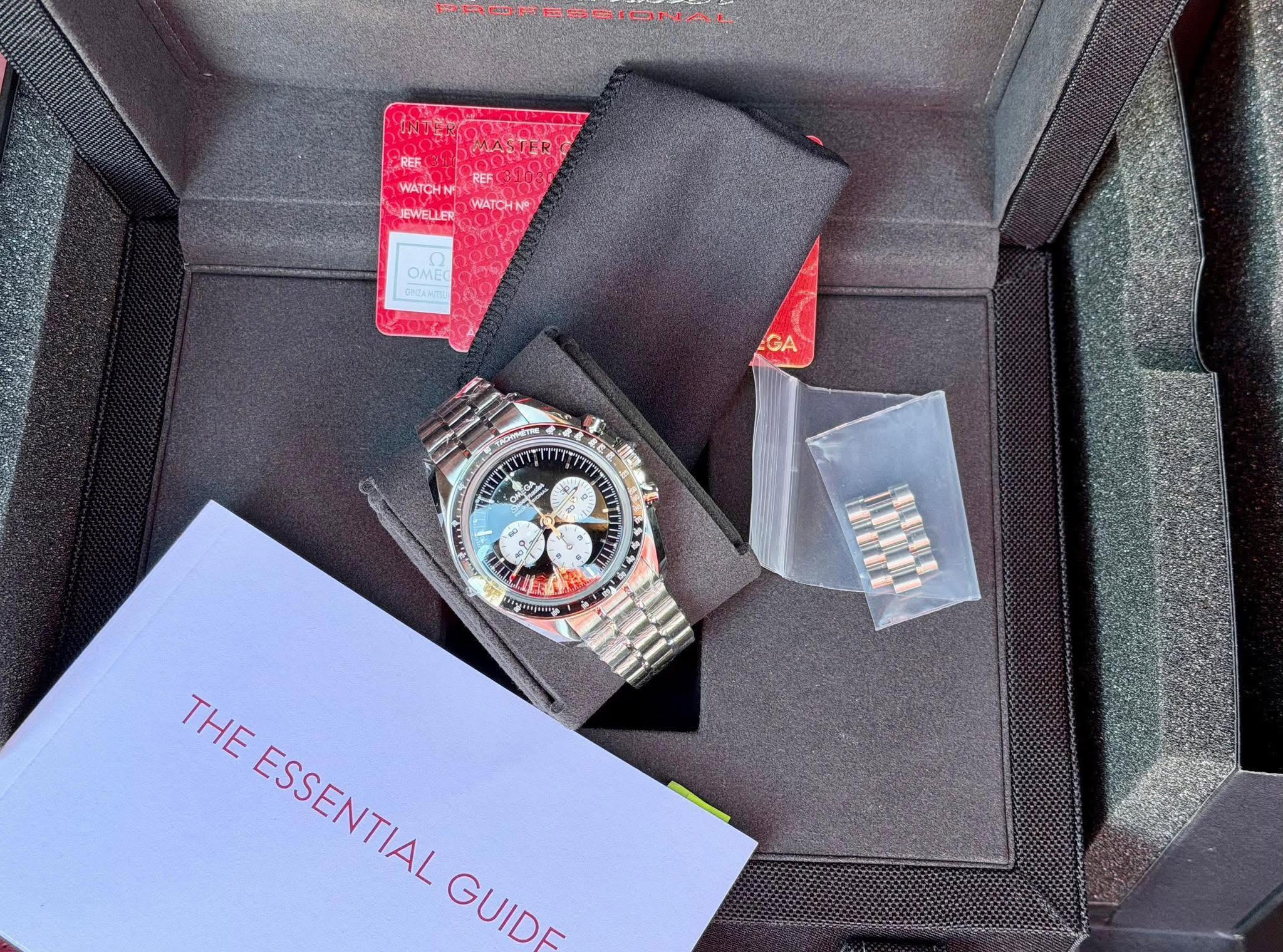 May be an image of wrist watch and text