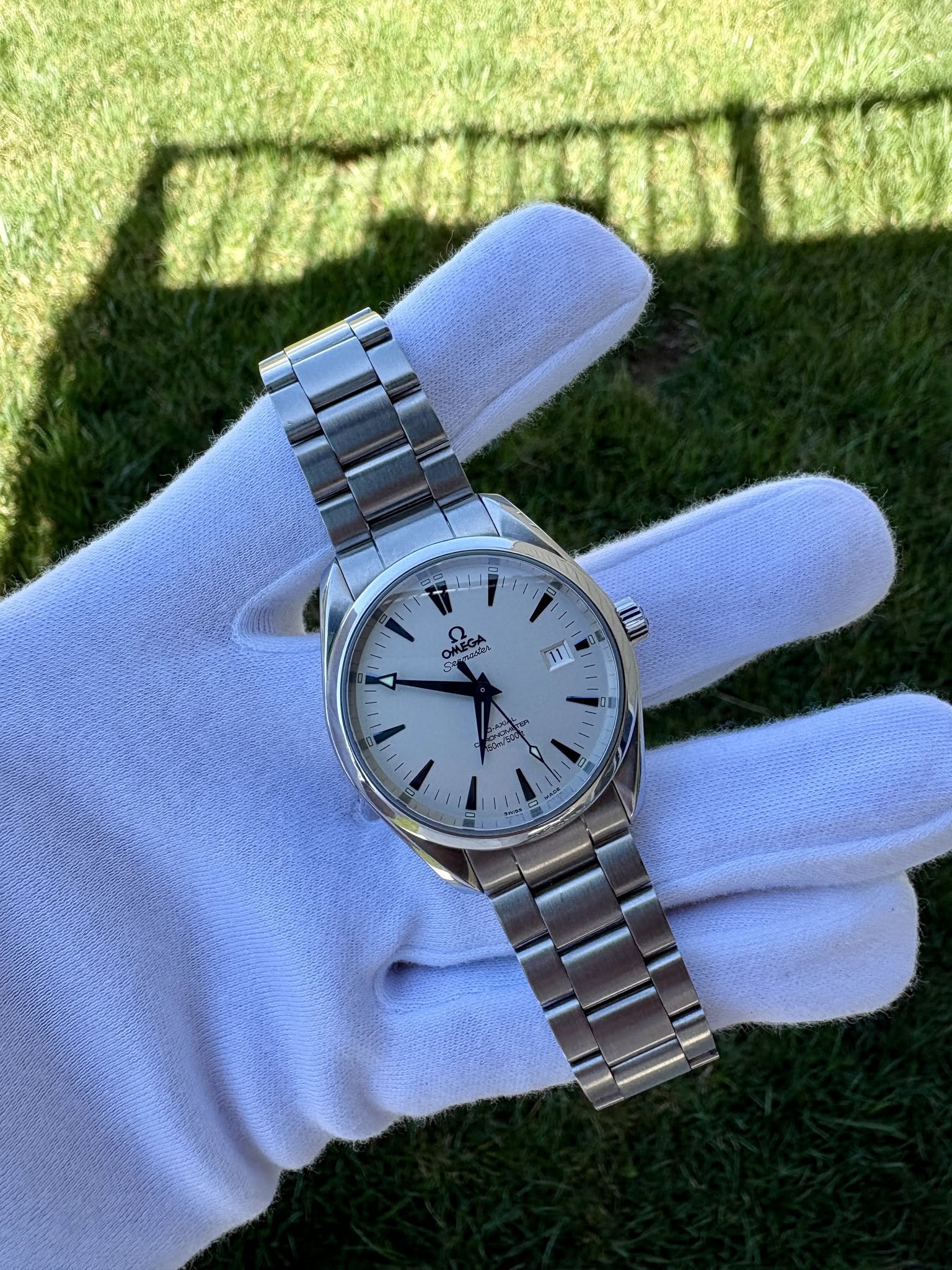 May be an image of wrist watch and text