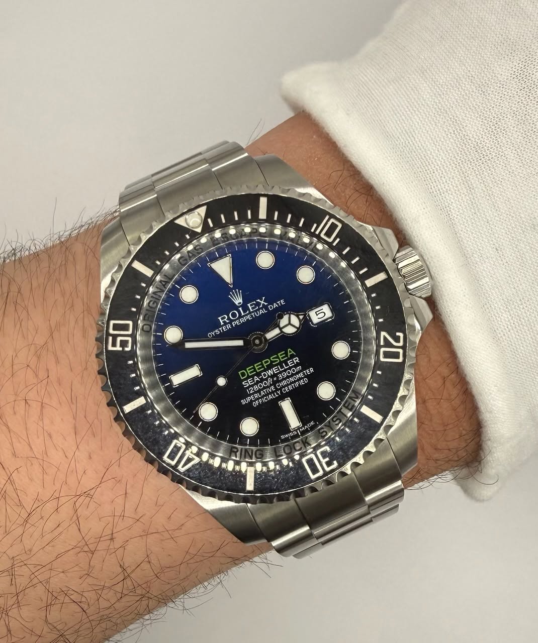 May be an image of wrist watch and text
