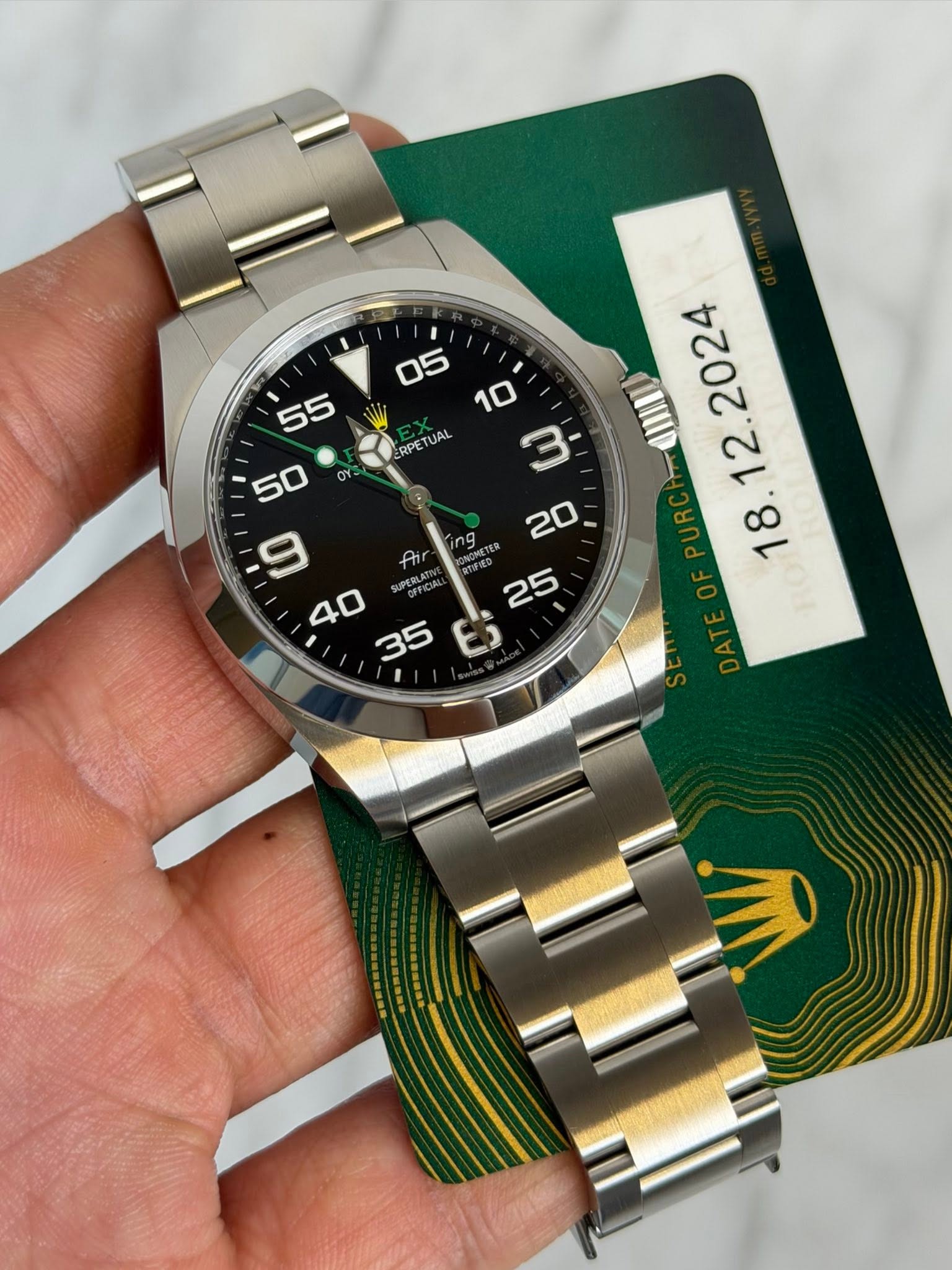 May be an image of wrist watch and text that says 'OY 05 - I 55 10 RPETUAL UAL RPET 3 I ل ロ i SUPERLAT 25 35 ذE ng .'