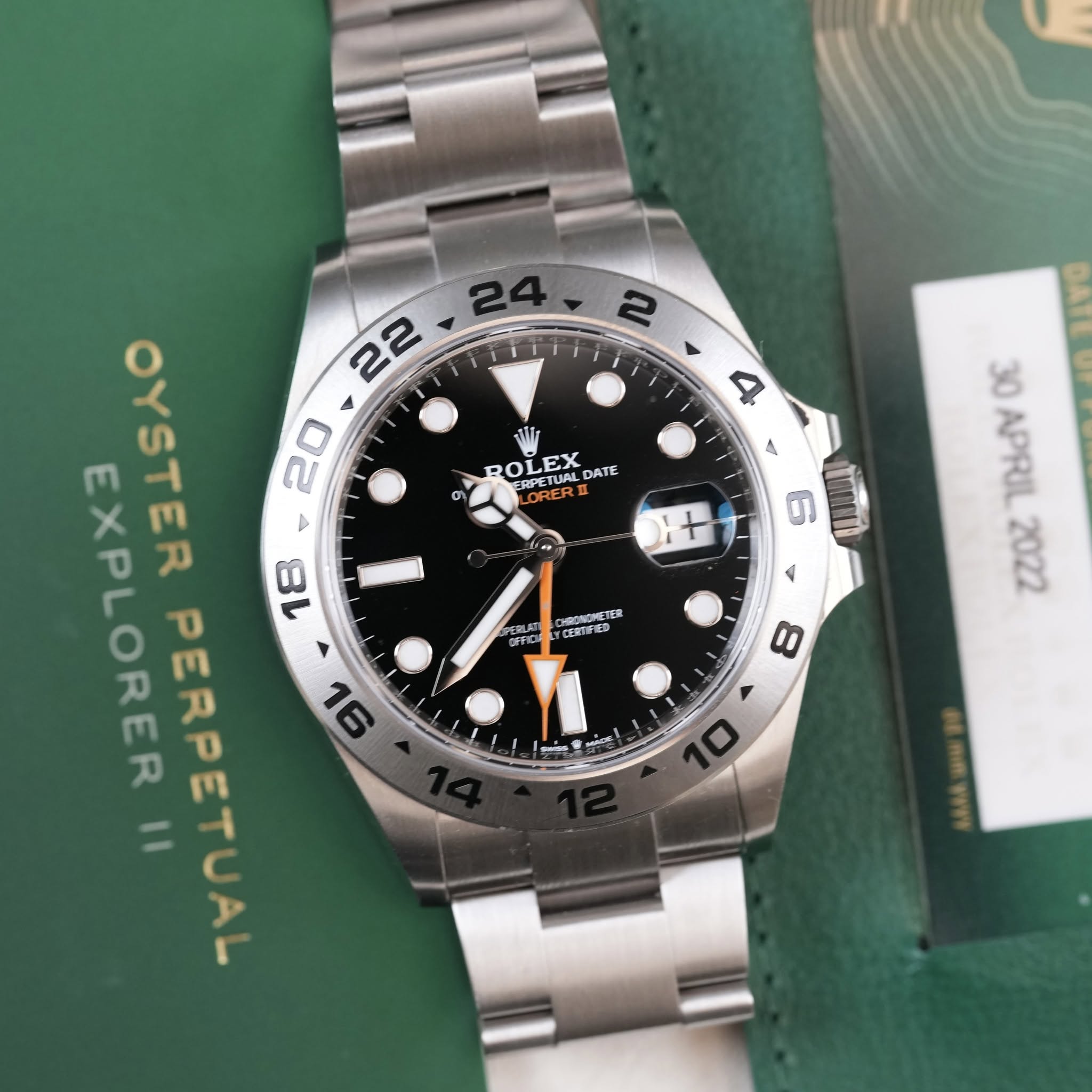 May be an image of wrist watch and text that says ' BOL BOLE GETLA ERPETUAL DATE 1ロト TORER 이 + 6 ΦΑΤΙ 30 30APRIL_202 2022 APRIL CERF OYSTER 22 20 EXPLORER II PERPETUAL 18 91 OFO…