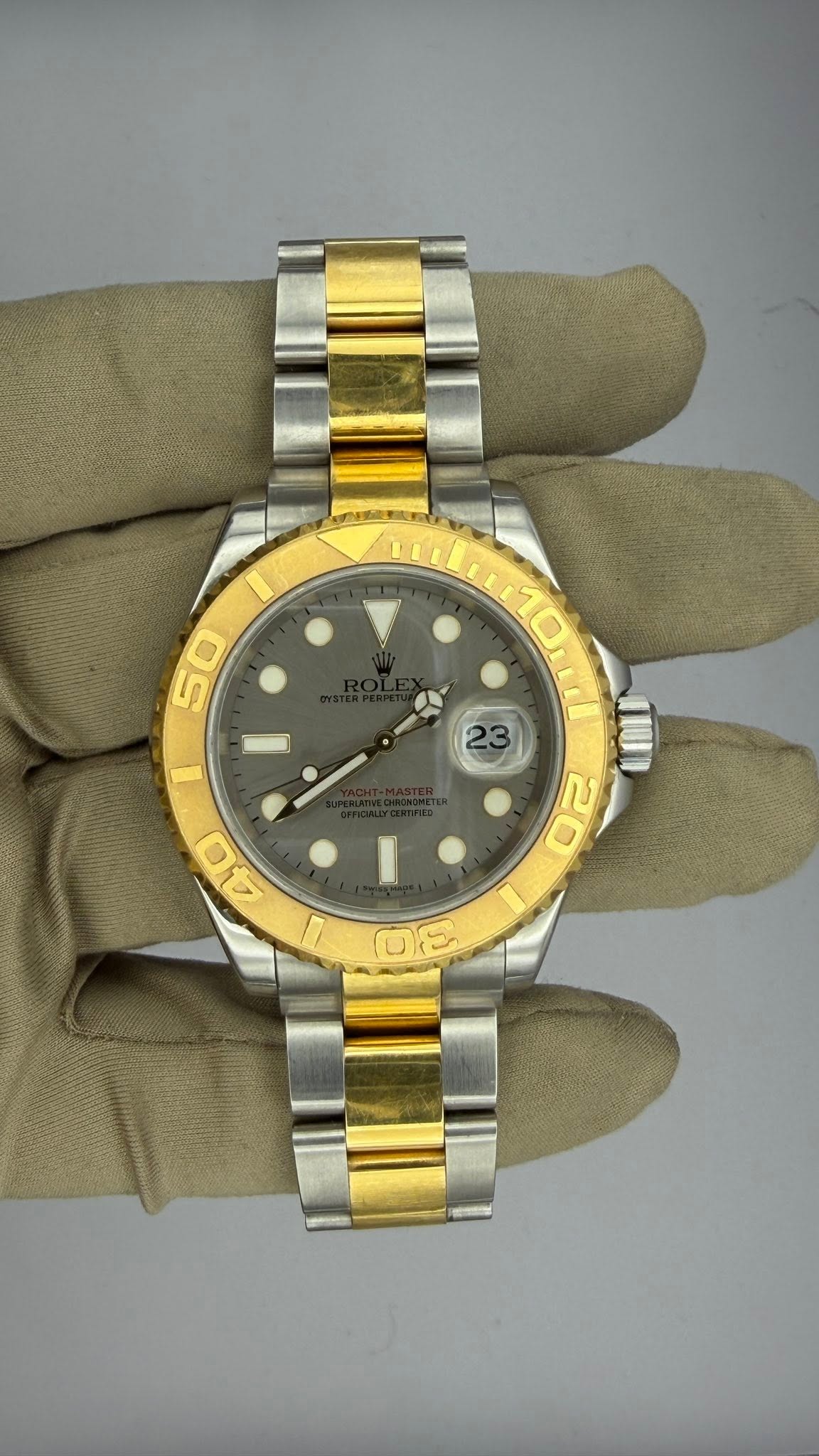 May be an image of wrist watch and text
