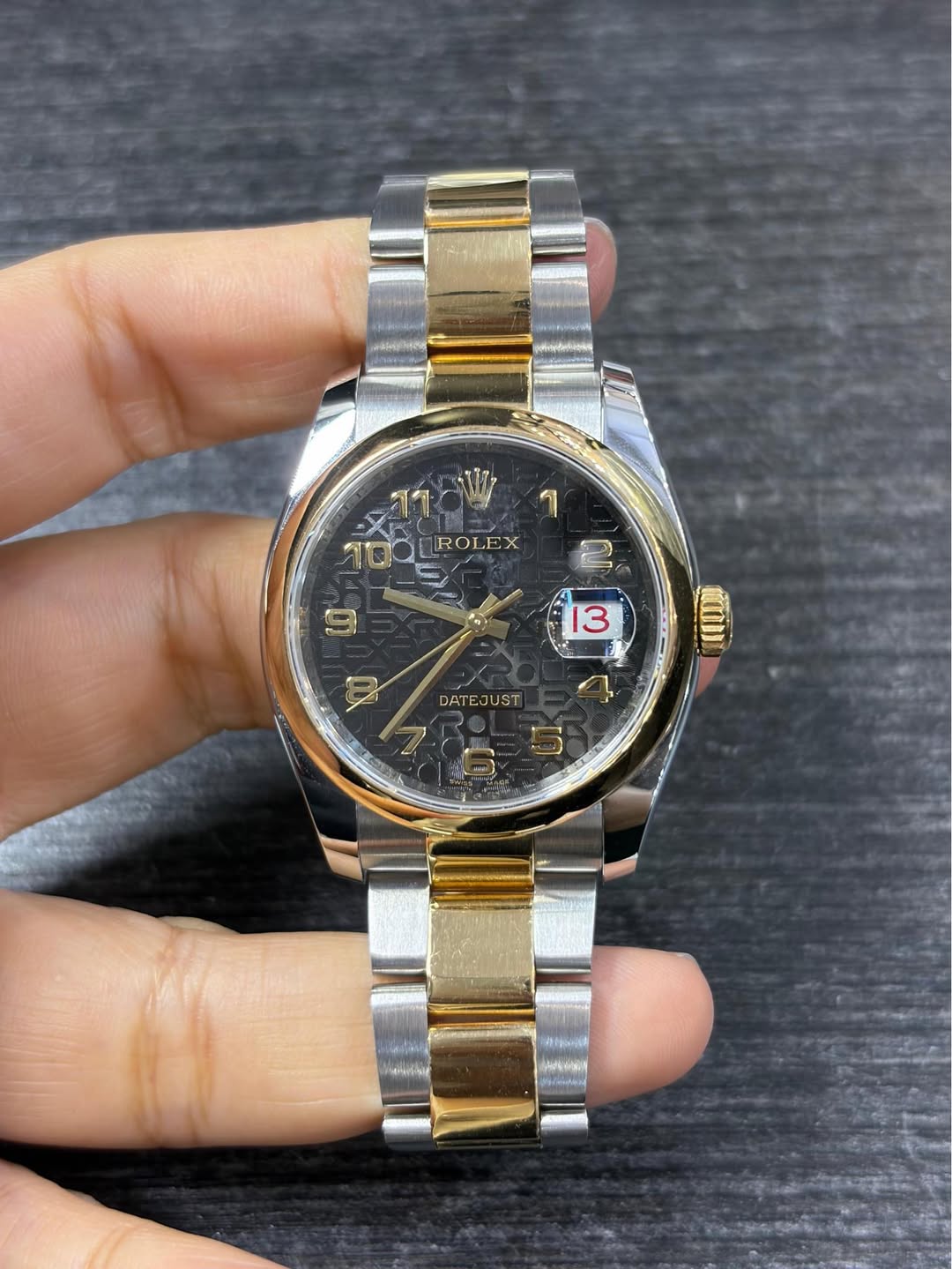 May be an image of wrist watch and text that says 'ROLEX EX ROL 2 13 DATEJ DATEJUST UST 4 I'