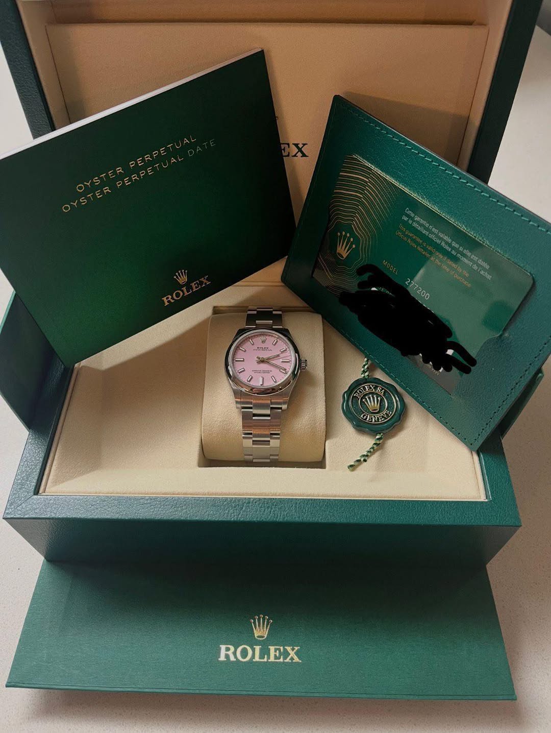 May be an image of wrist watch and text
