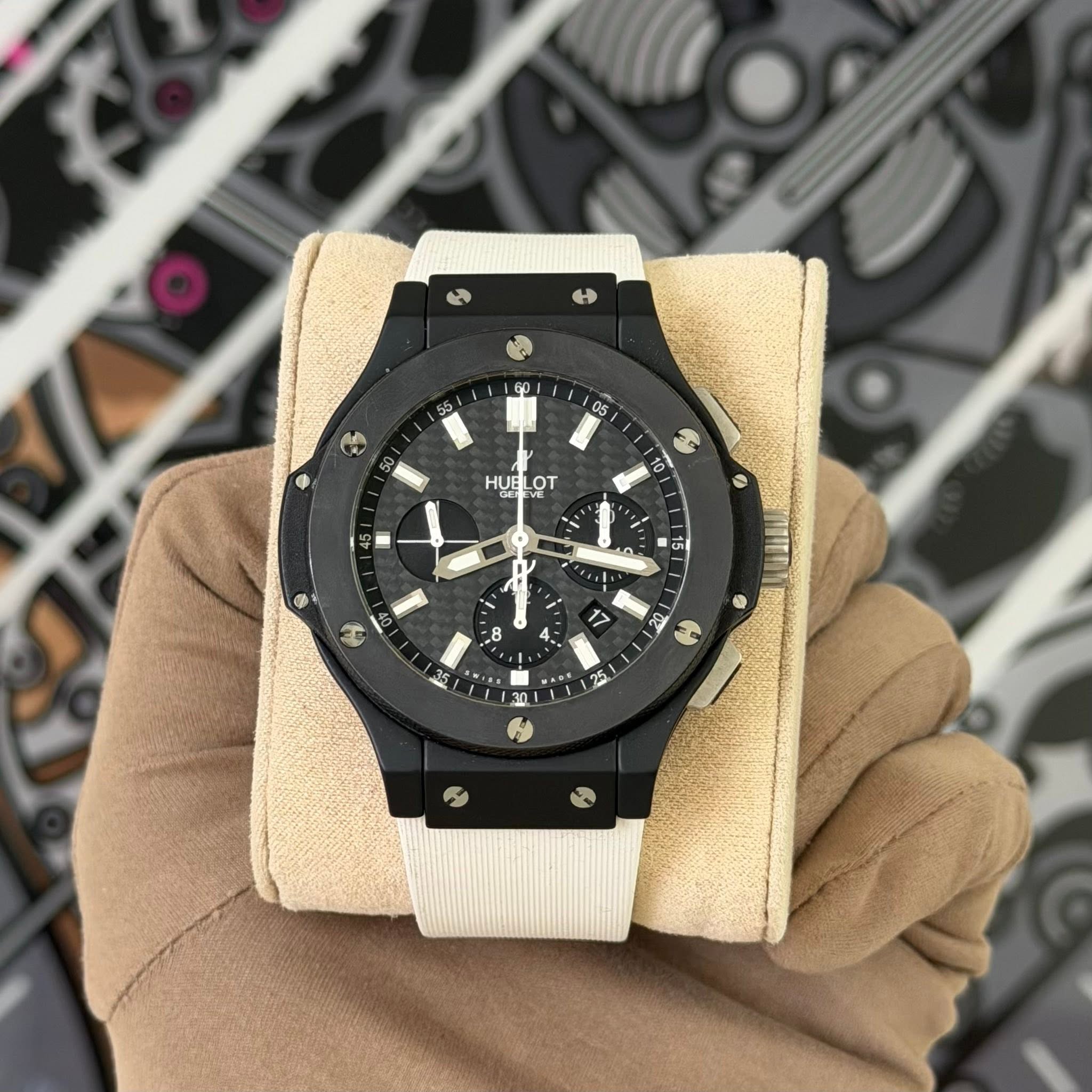 May be an image of wrist watch and text