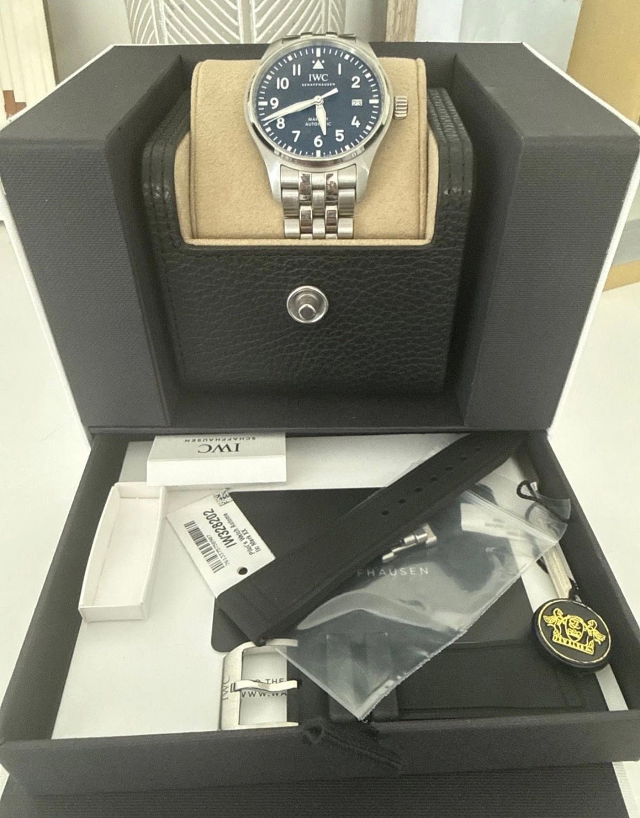 May be an image of wrist watch and text