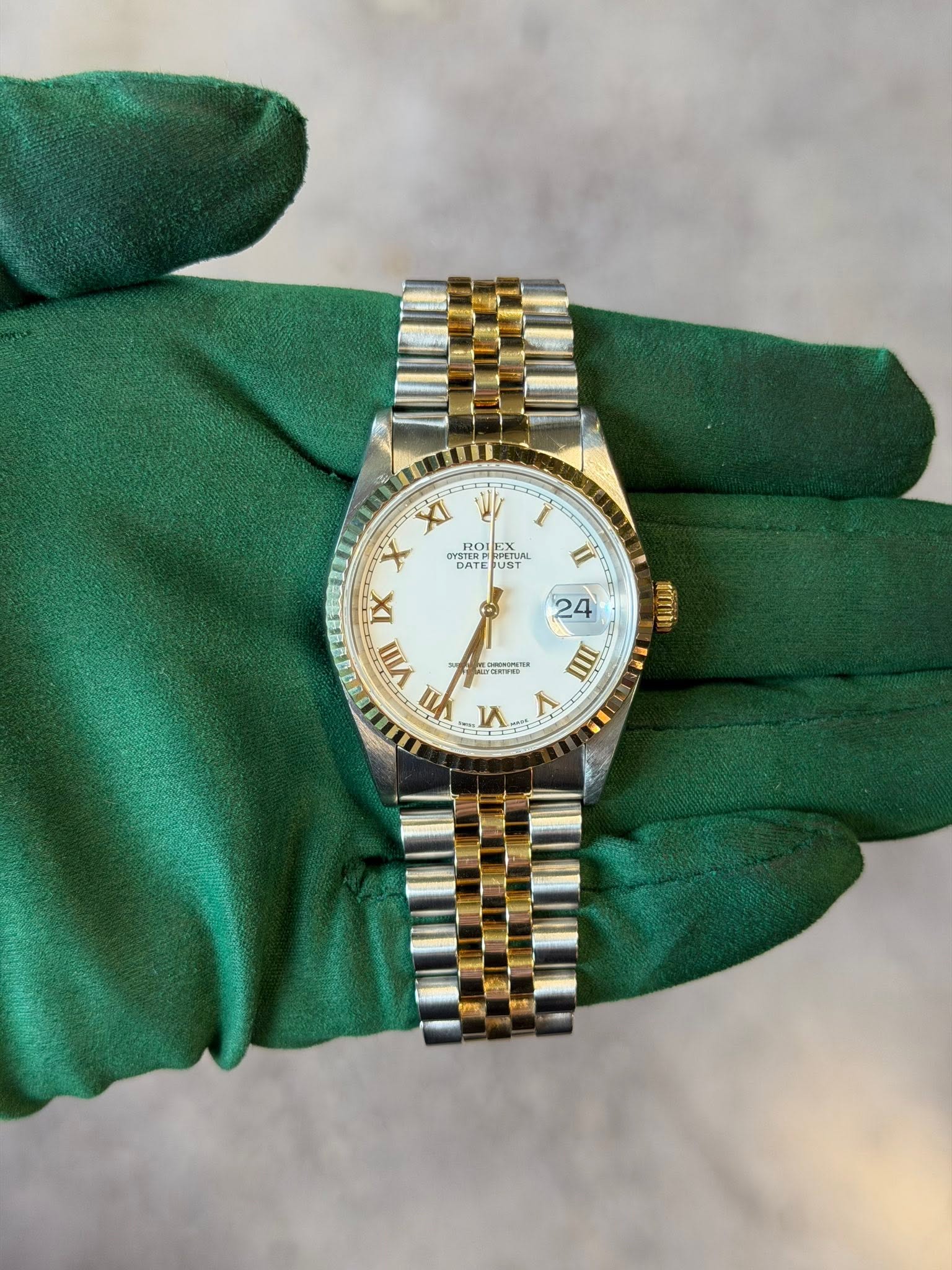May be an image of wrist watch and text