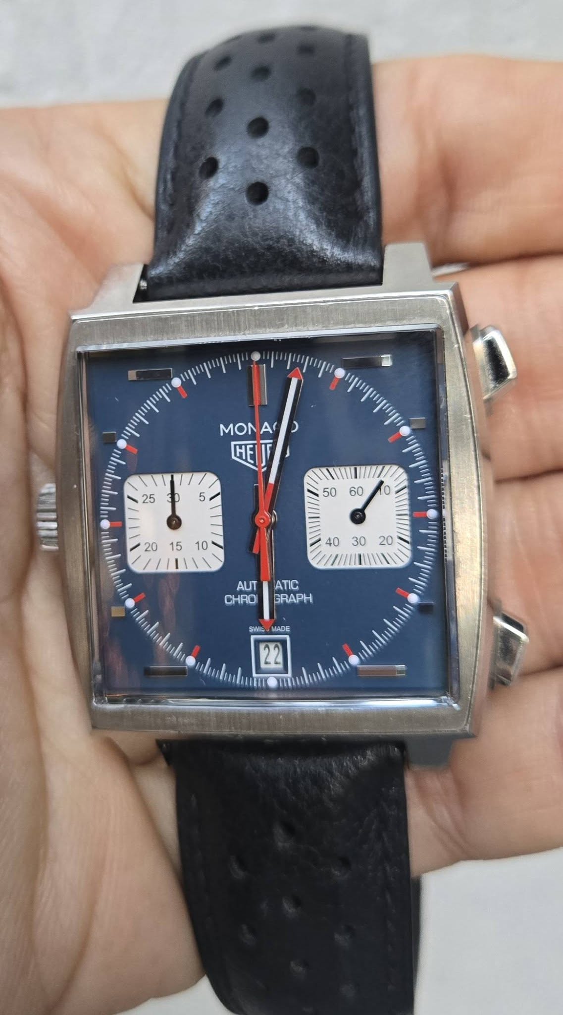 May be an image of digital watch and text