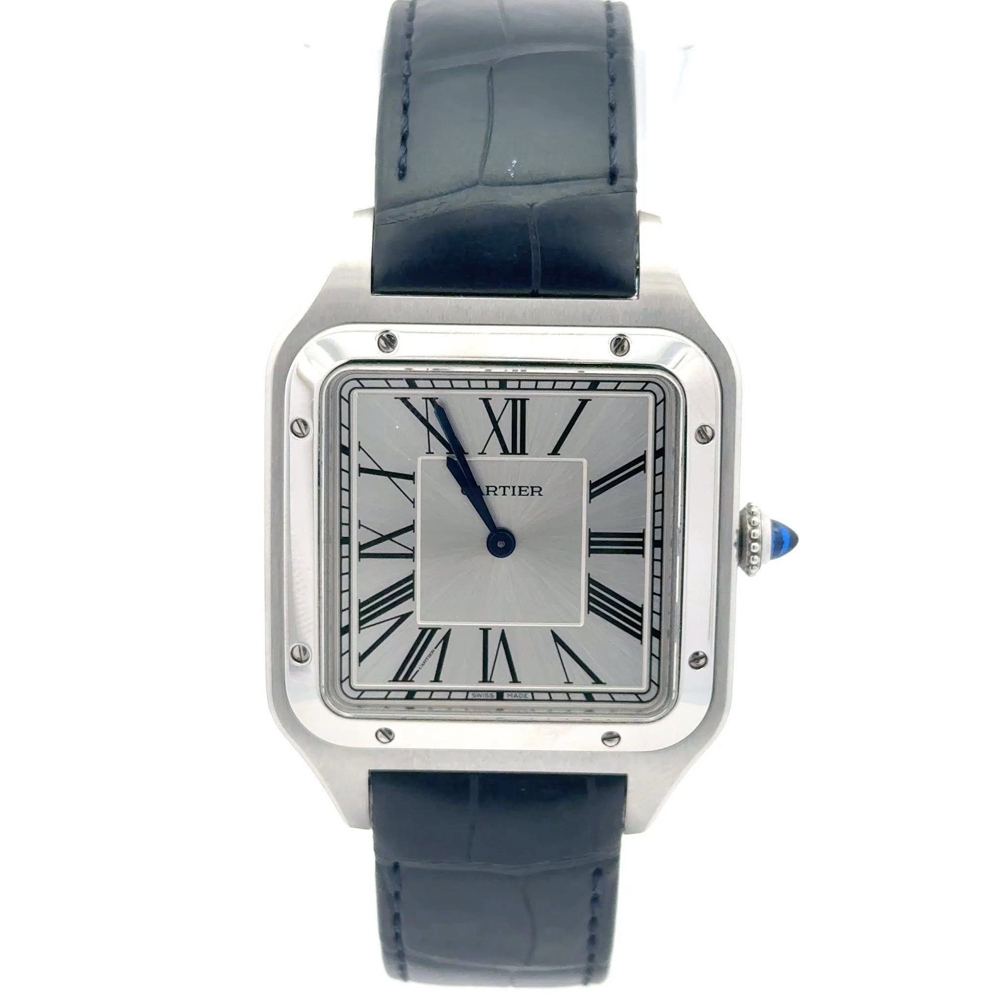 May be an image of wrist watch and text that says '۱\/ XII RTIER ER 2565 65'