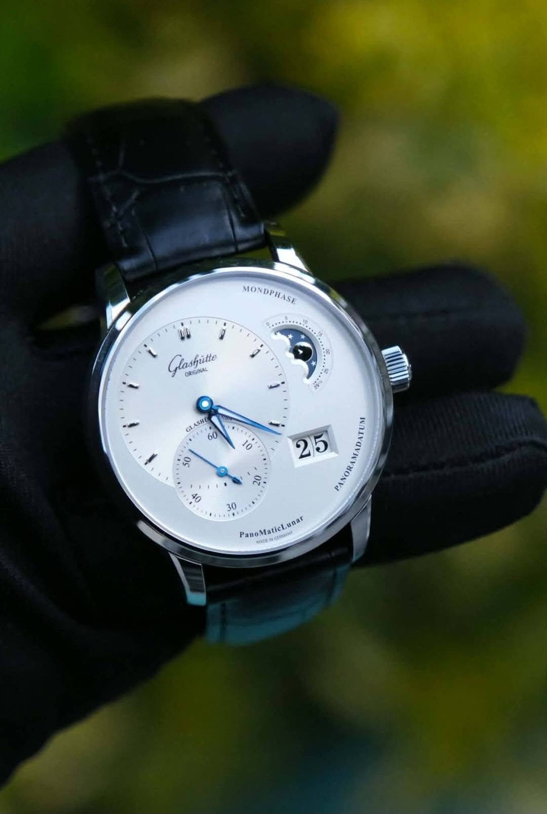 May be an image of wrist watch and text
