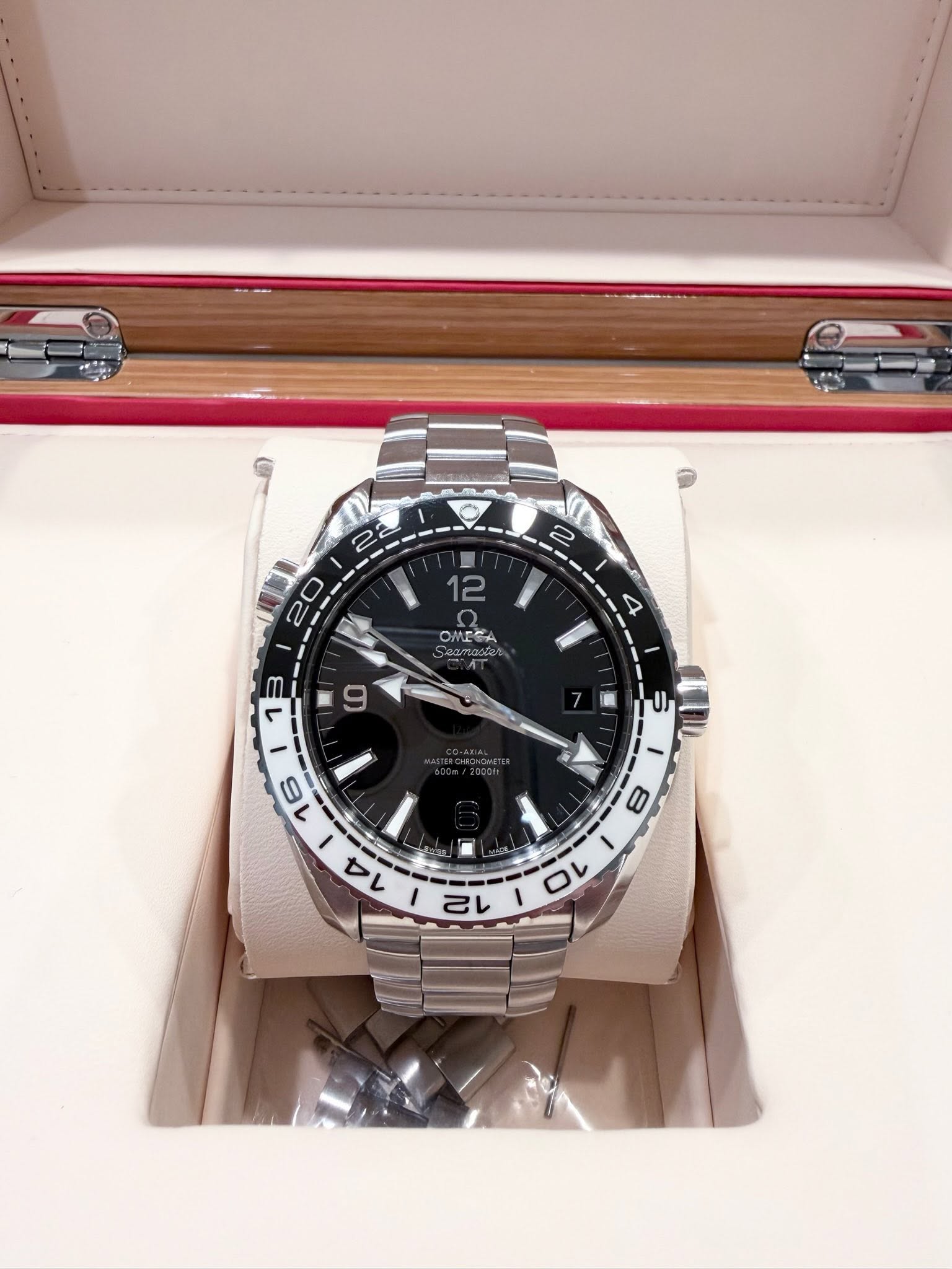 May be an image of wrist watch and text