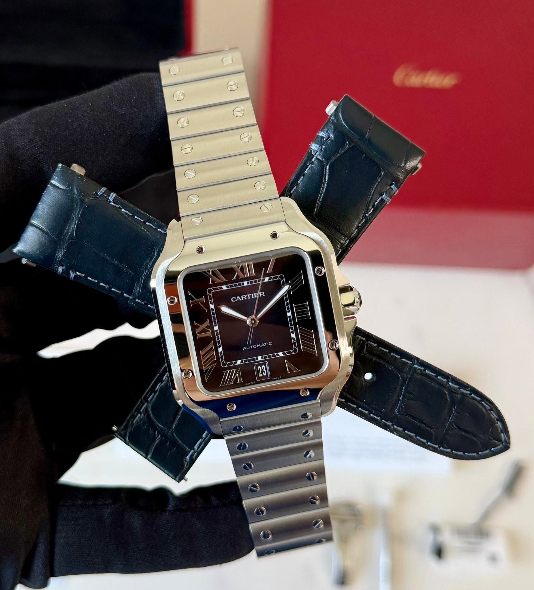 May be an image of digital watch and text that says '6 ๗ี B C R e 9 me AP CARTIER'