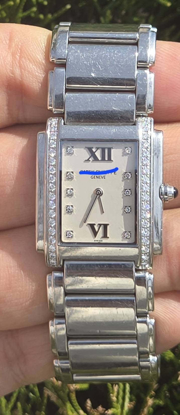 May be an image of digital watch and text