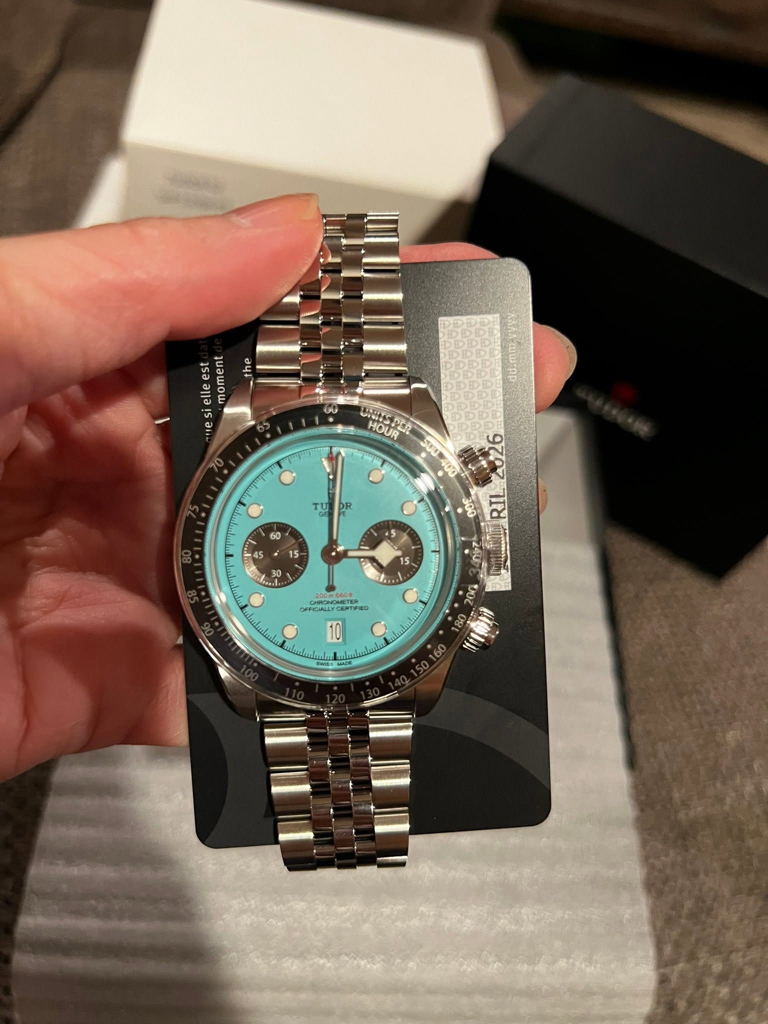 May be an image of wrist watch and text